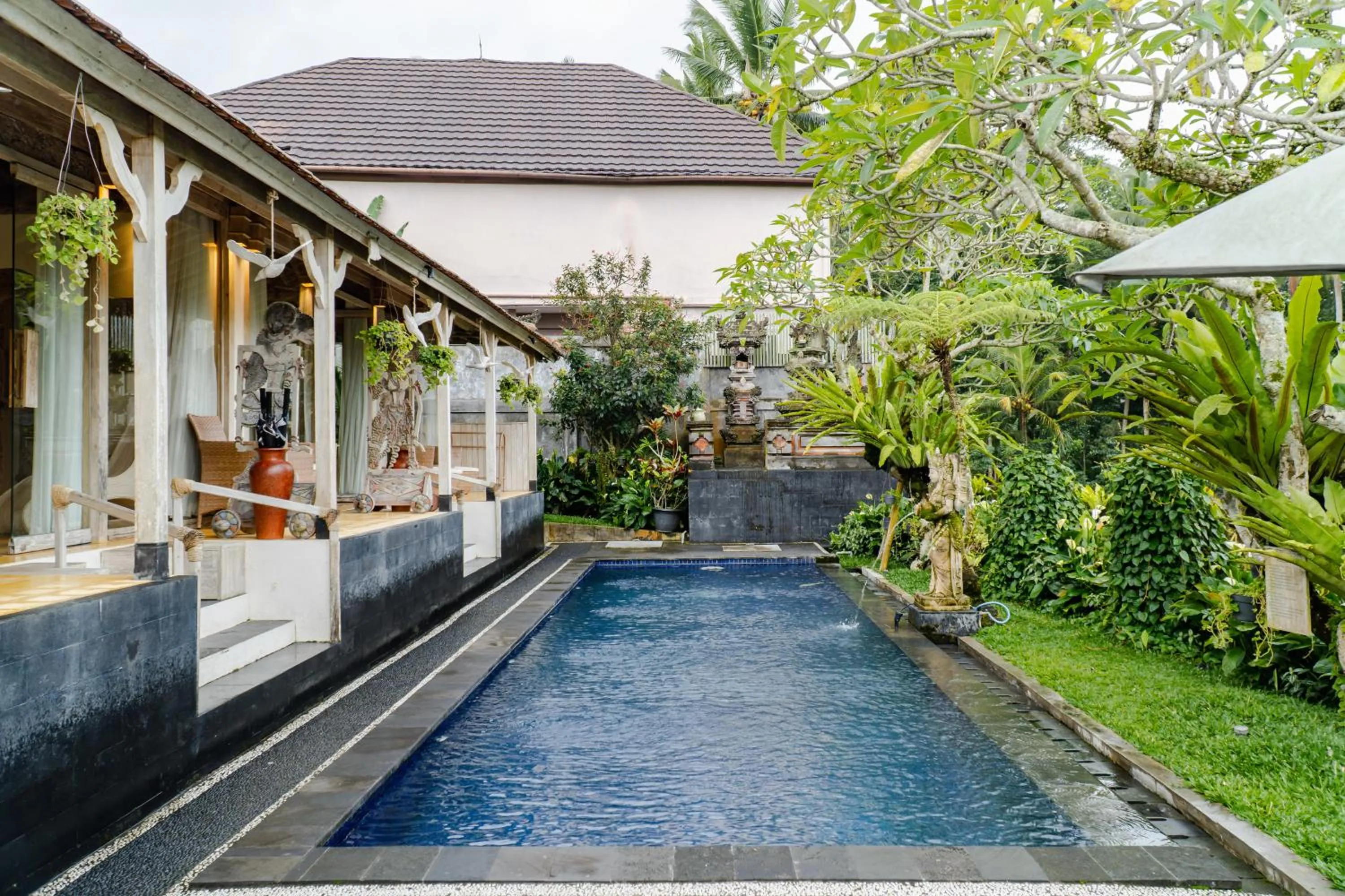 Swimming pool in Tri Dewi Residence by GenuineHost