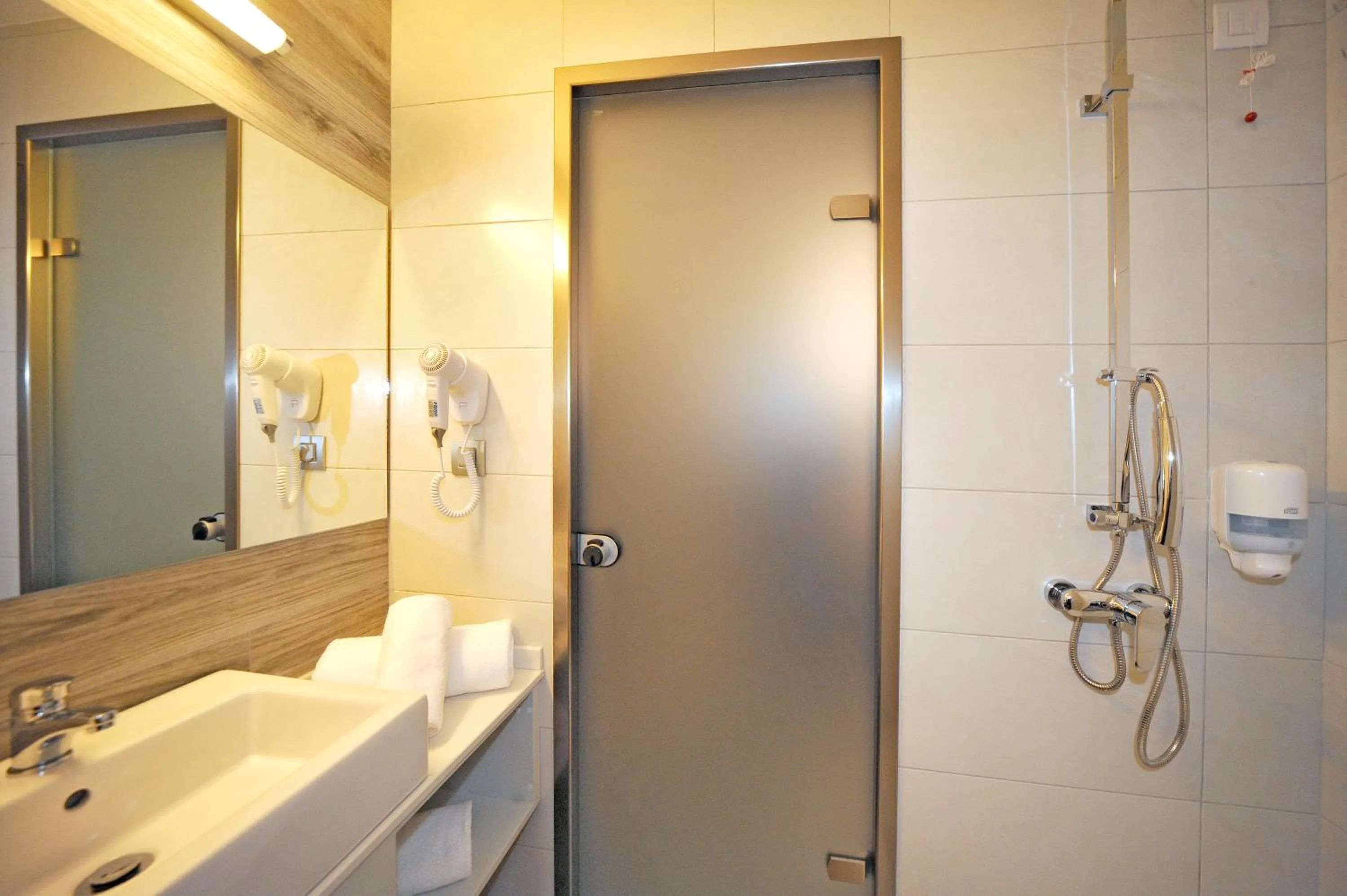 Shower in Astron Suites & Apartments