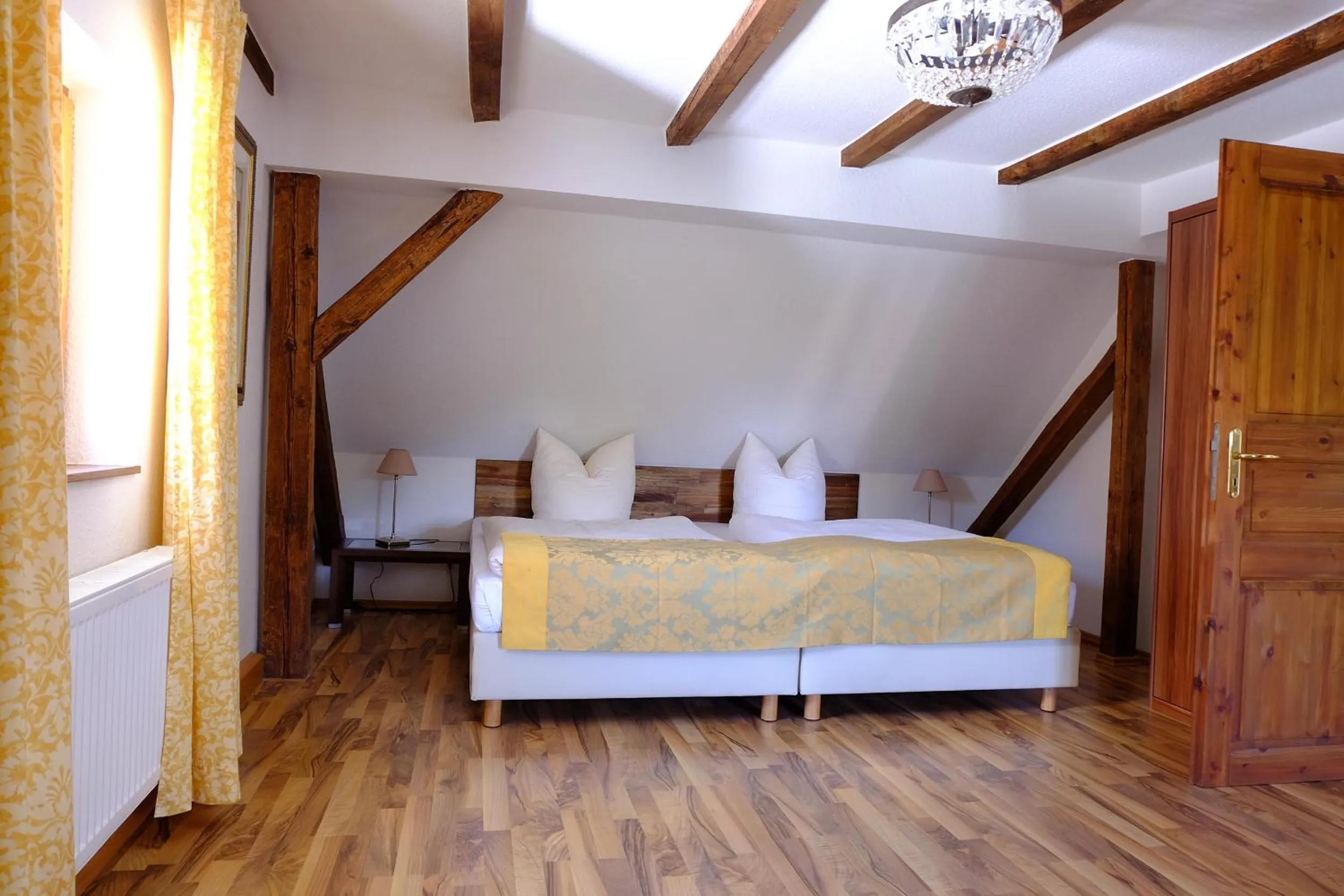 Photo of the whole room, Bed in Hotel Schlossresidenz Heitzenhofen