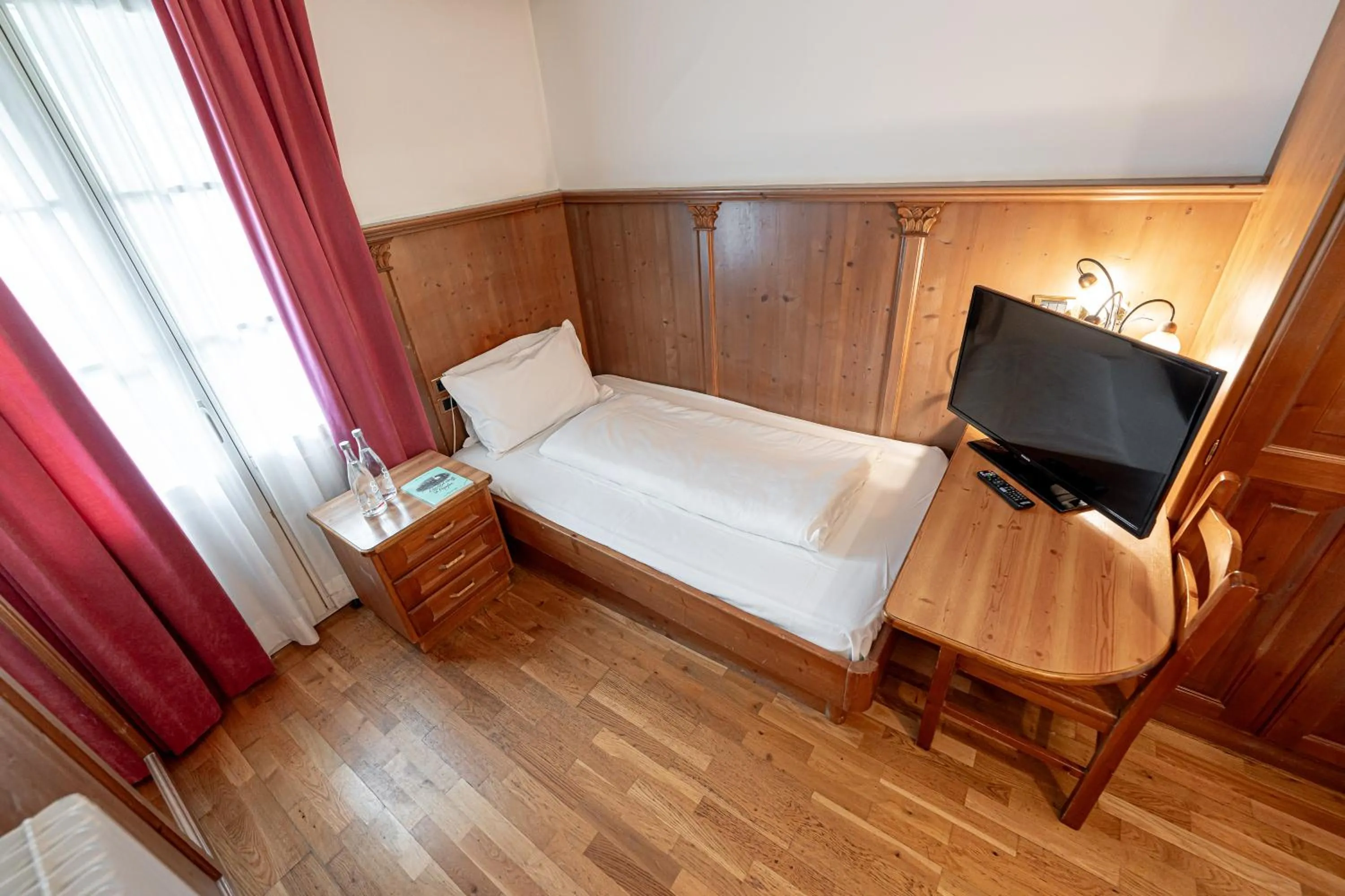 Bedroom, Bed in Hotel Dolomiti Schloss