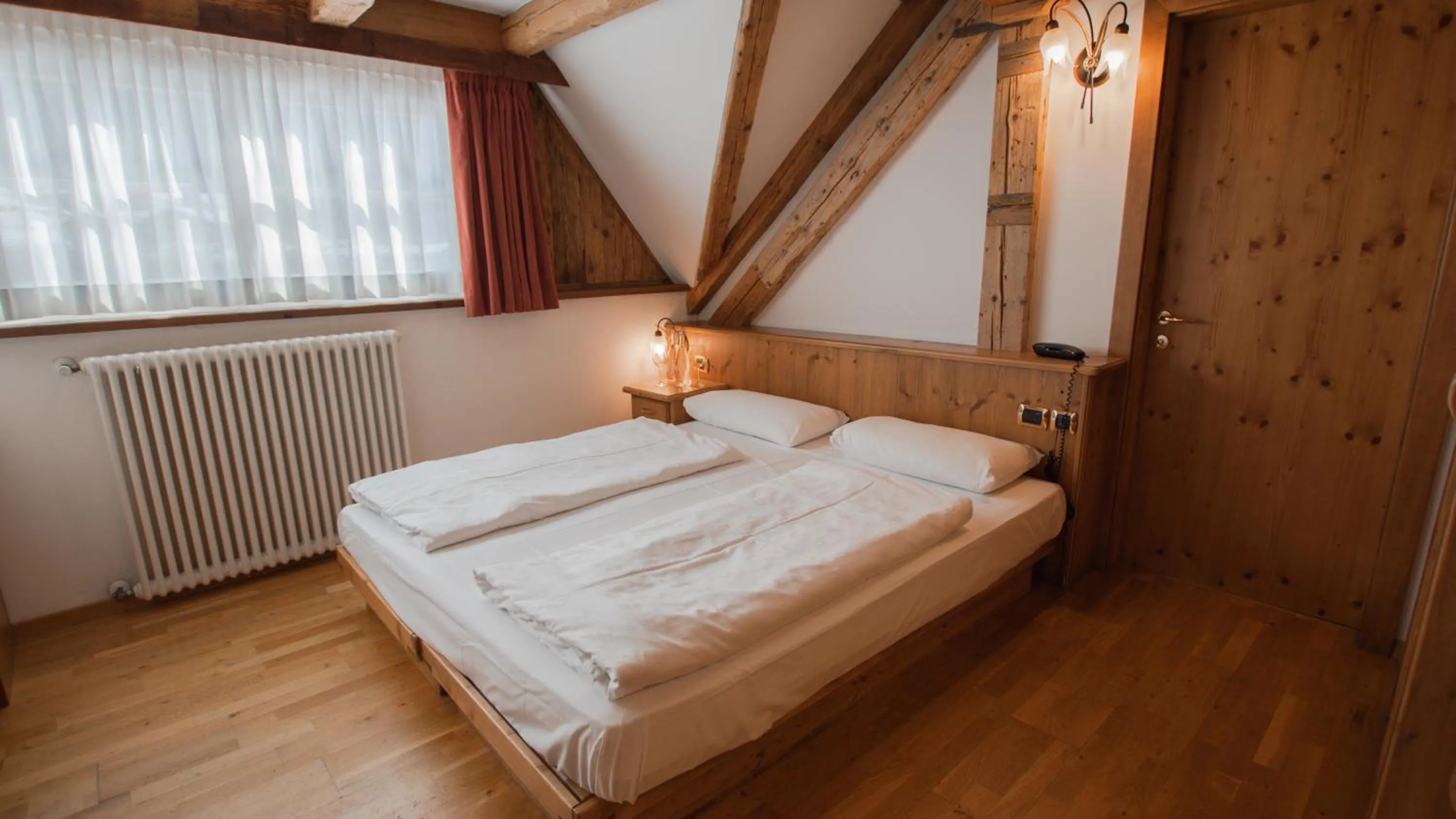 Bedroom, Bed in Hotel Dolomiti Schloss