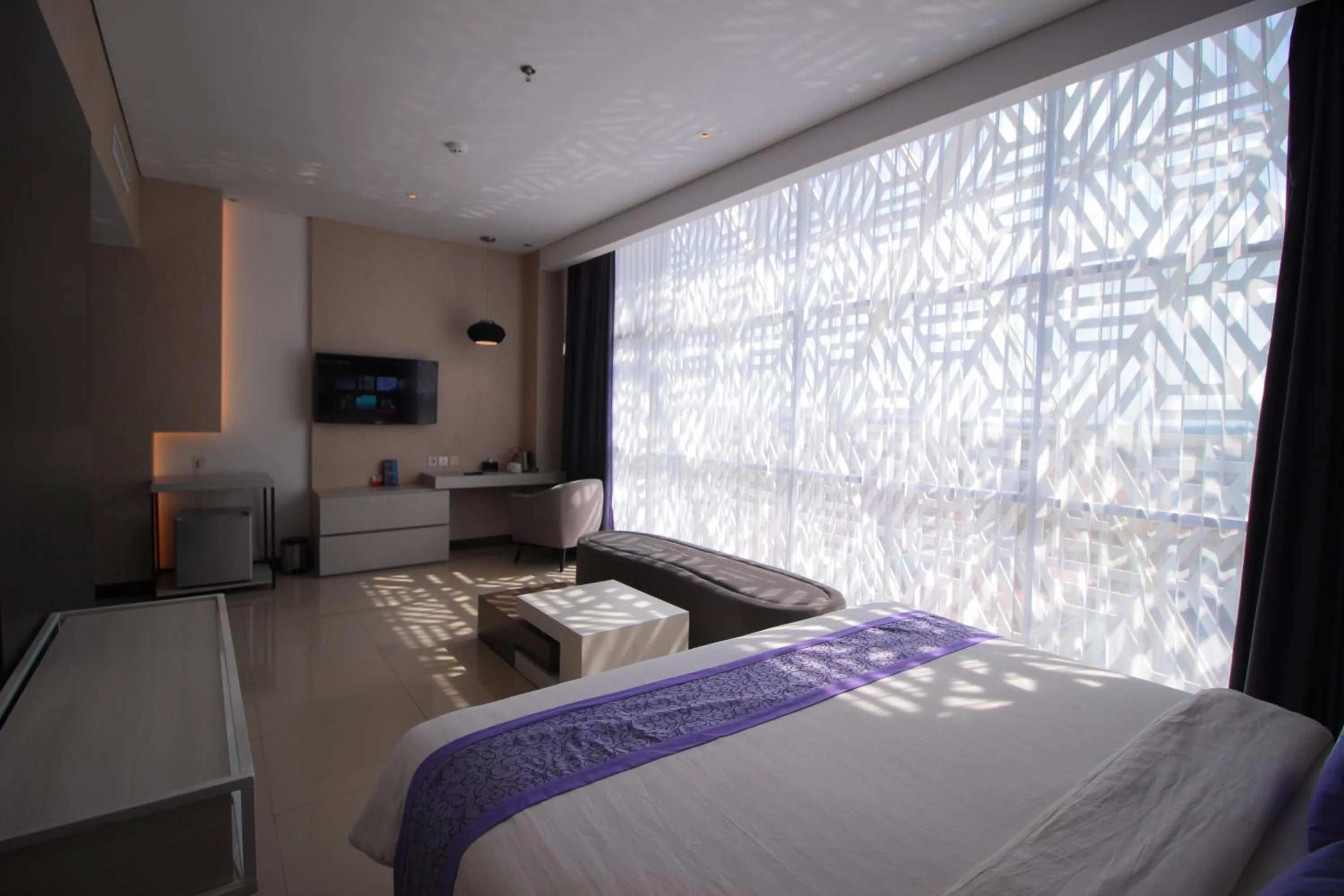 Bed in Forriz Hotel Yogyakarta