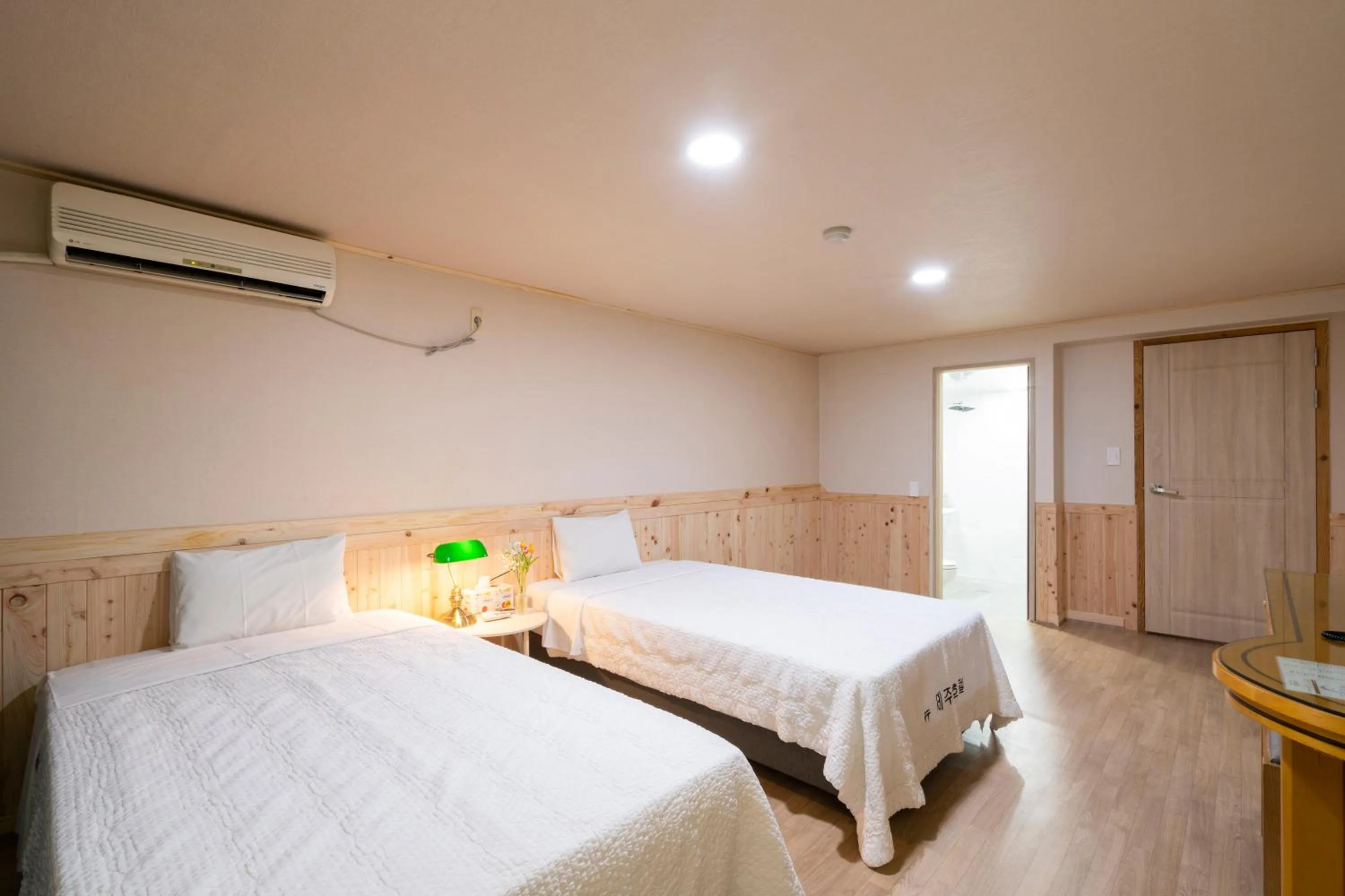 Bed in New Jeju Hotel