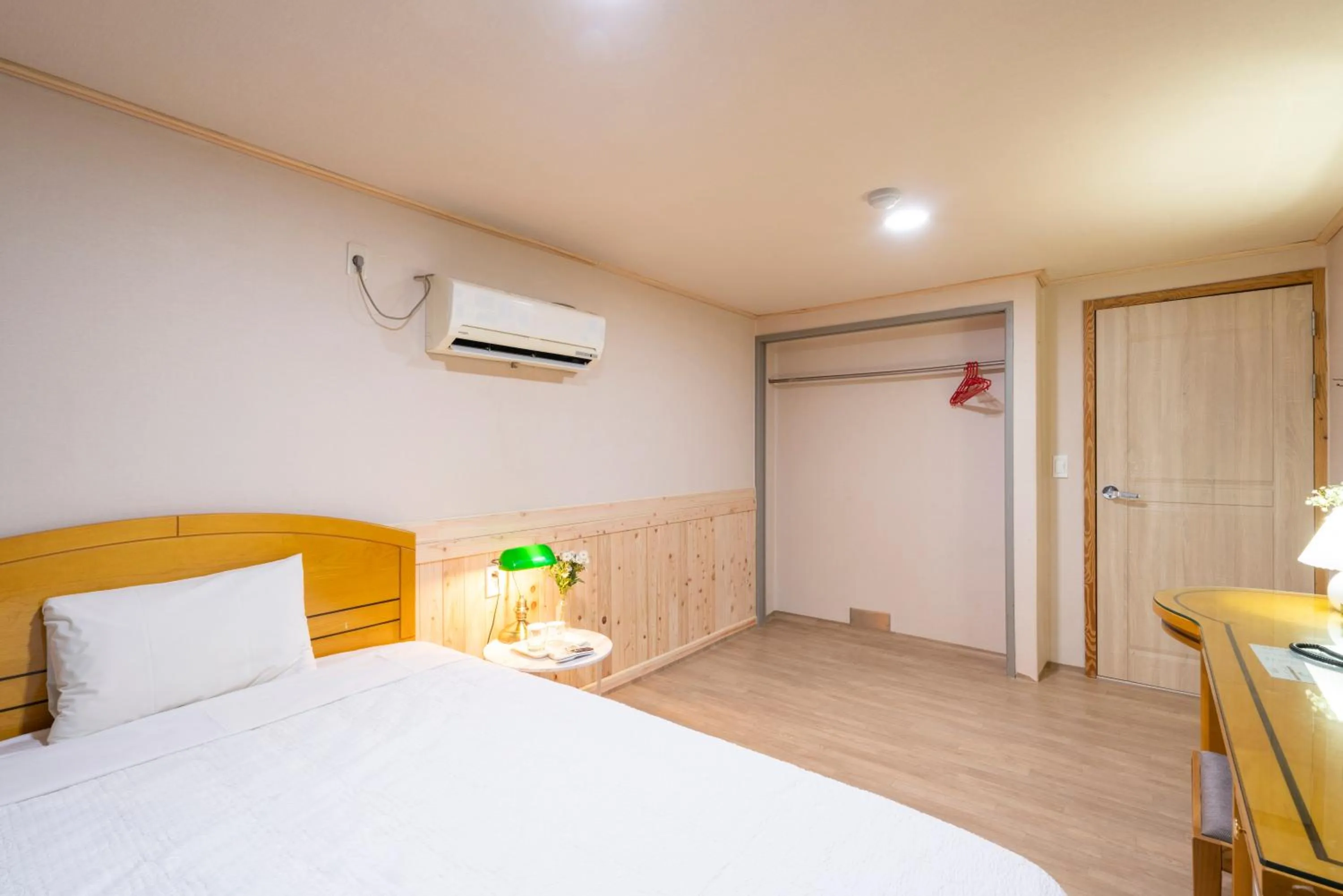 Bed in New Jeju Hotel