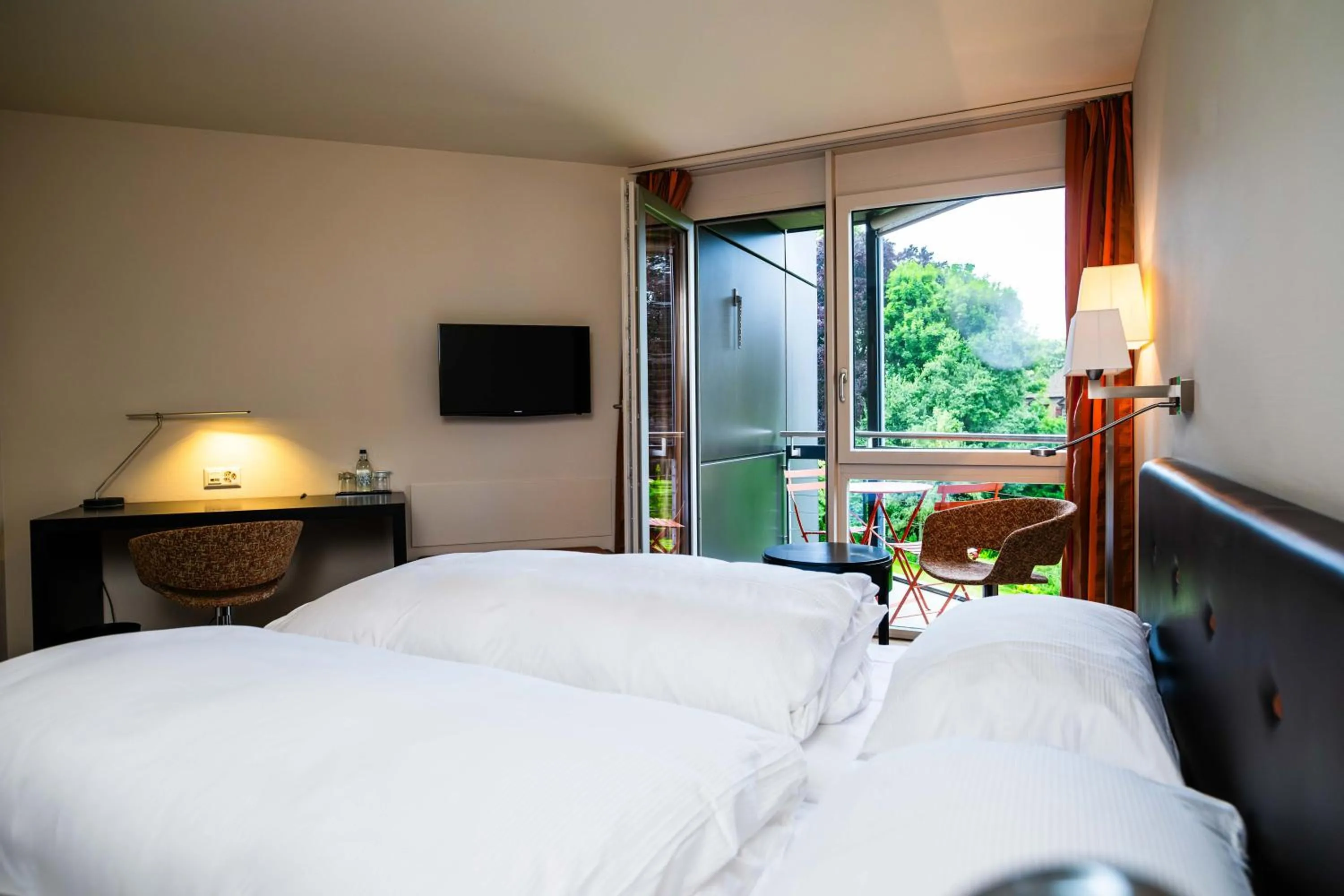Photo of the whole room, Bed in Hotel Seepark Thun