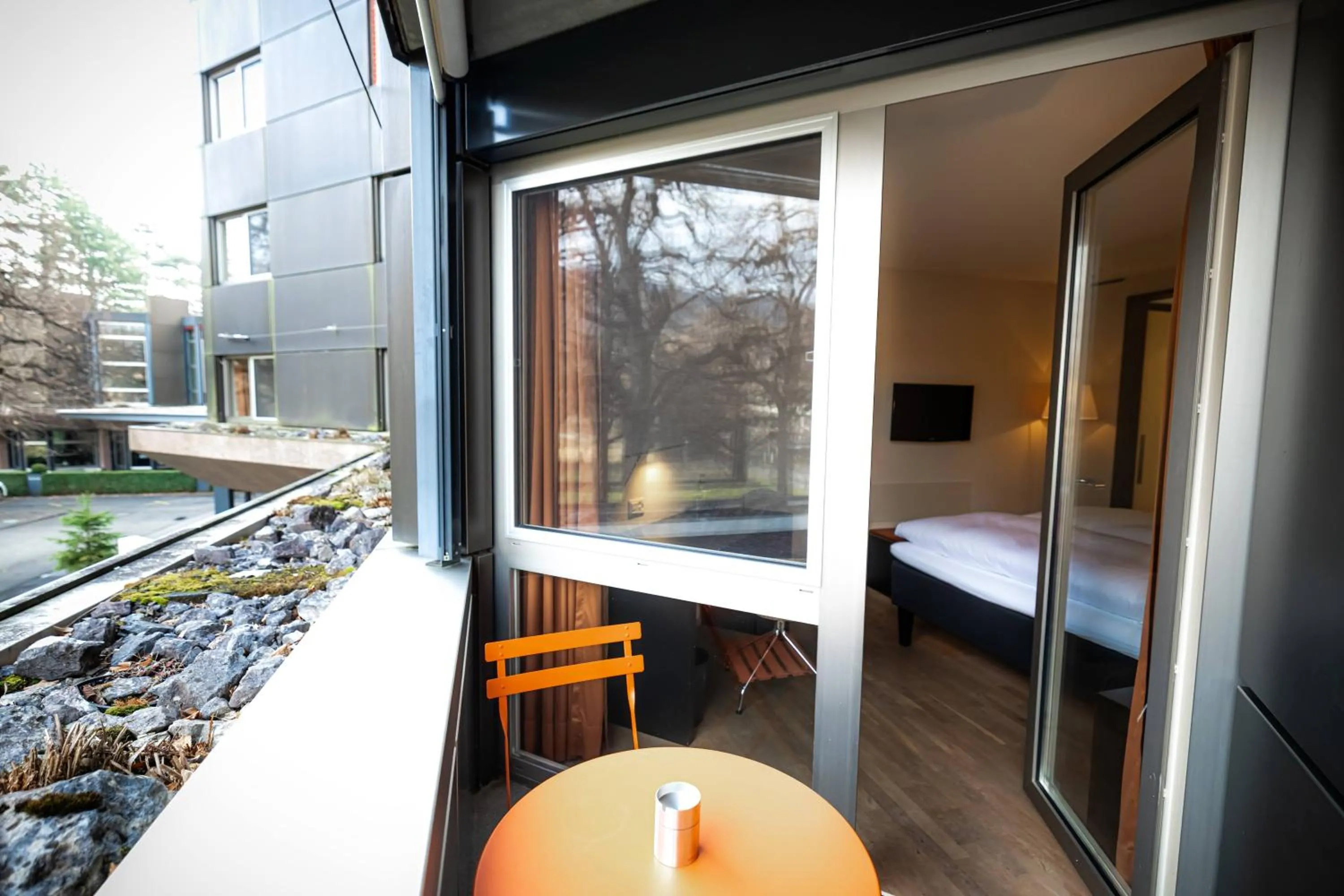 Balcony/Terrace, Bed in Hotel Seepark Thun