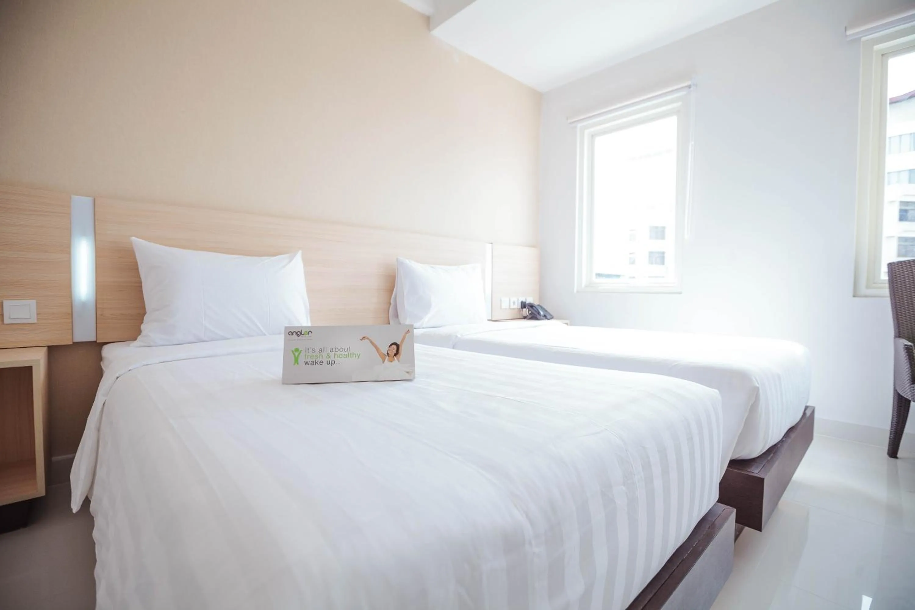 Bedroom, Bed in Whiz Prime Hotel Sudirman Makassar