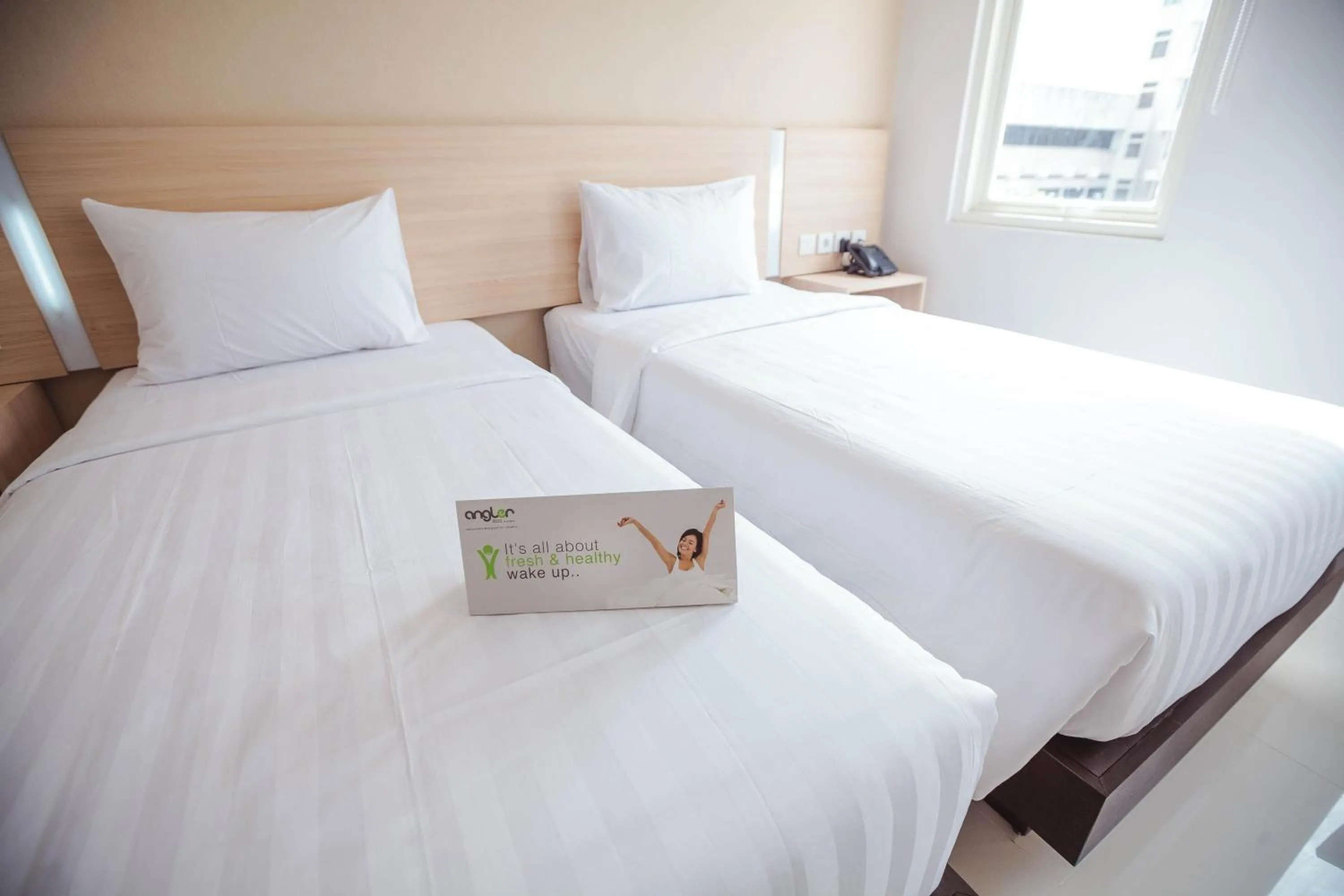 Bed in Whiz Prime Hotel Sudirman Makassar