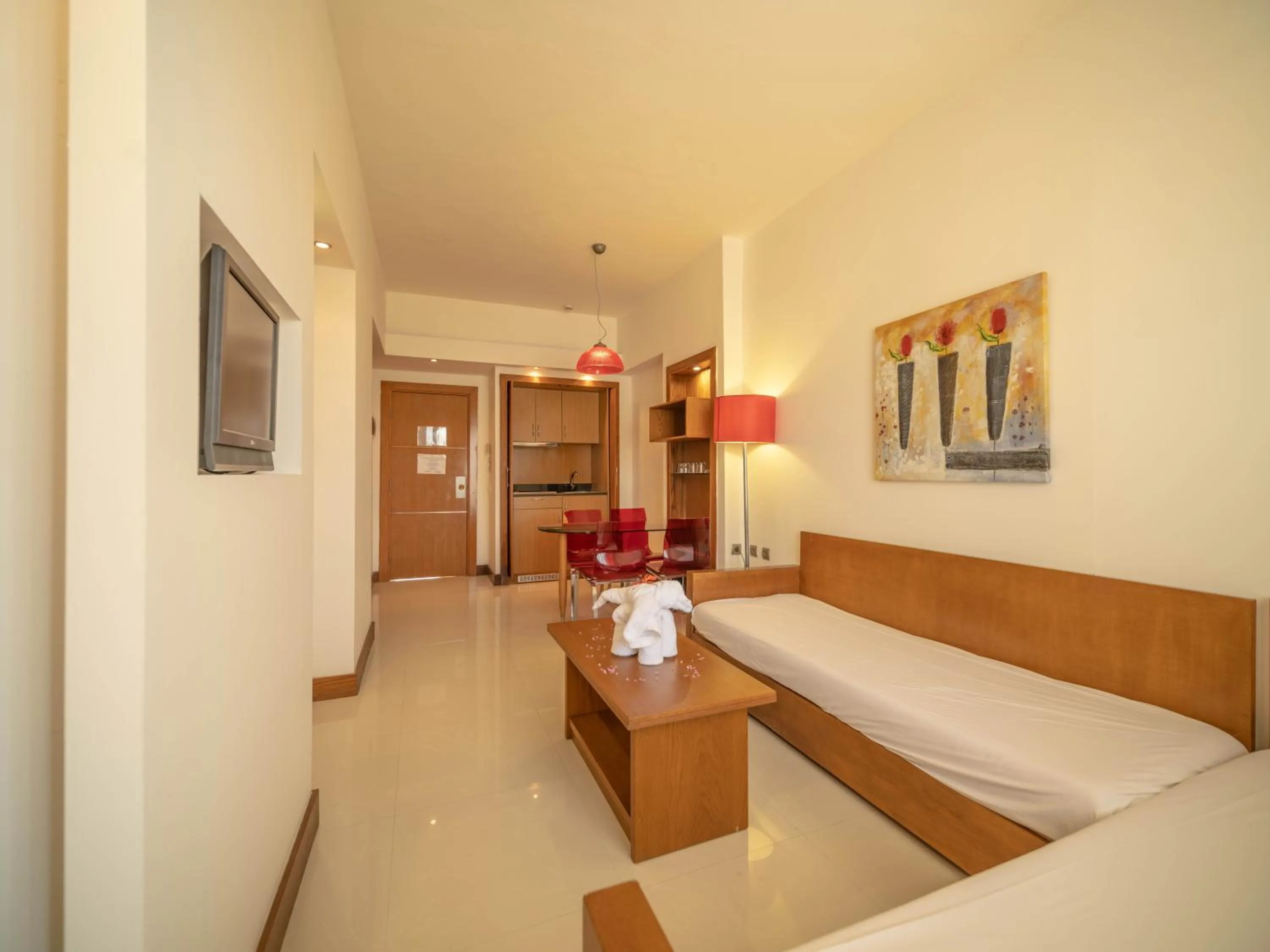 Seating area, Bed in Sunshine Rhodes