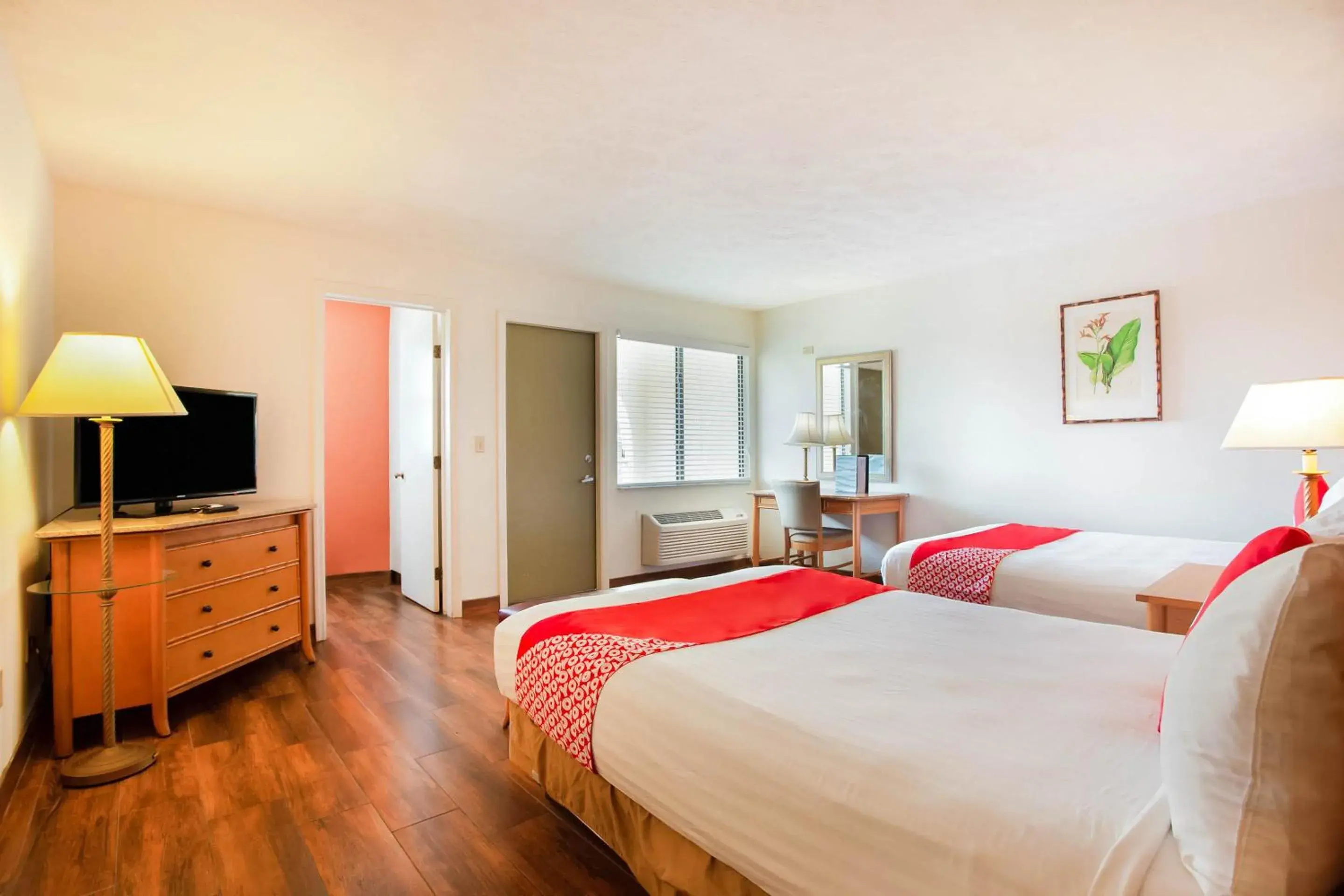 TV and multimedia, Bed in OYO Waterfront Hotel- Cape Coral Fort Myers, FL