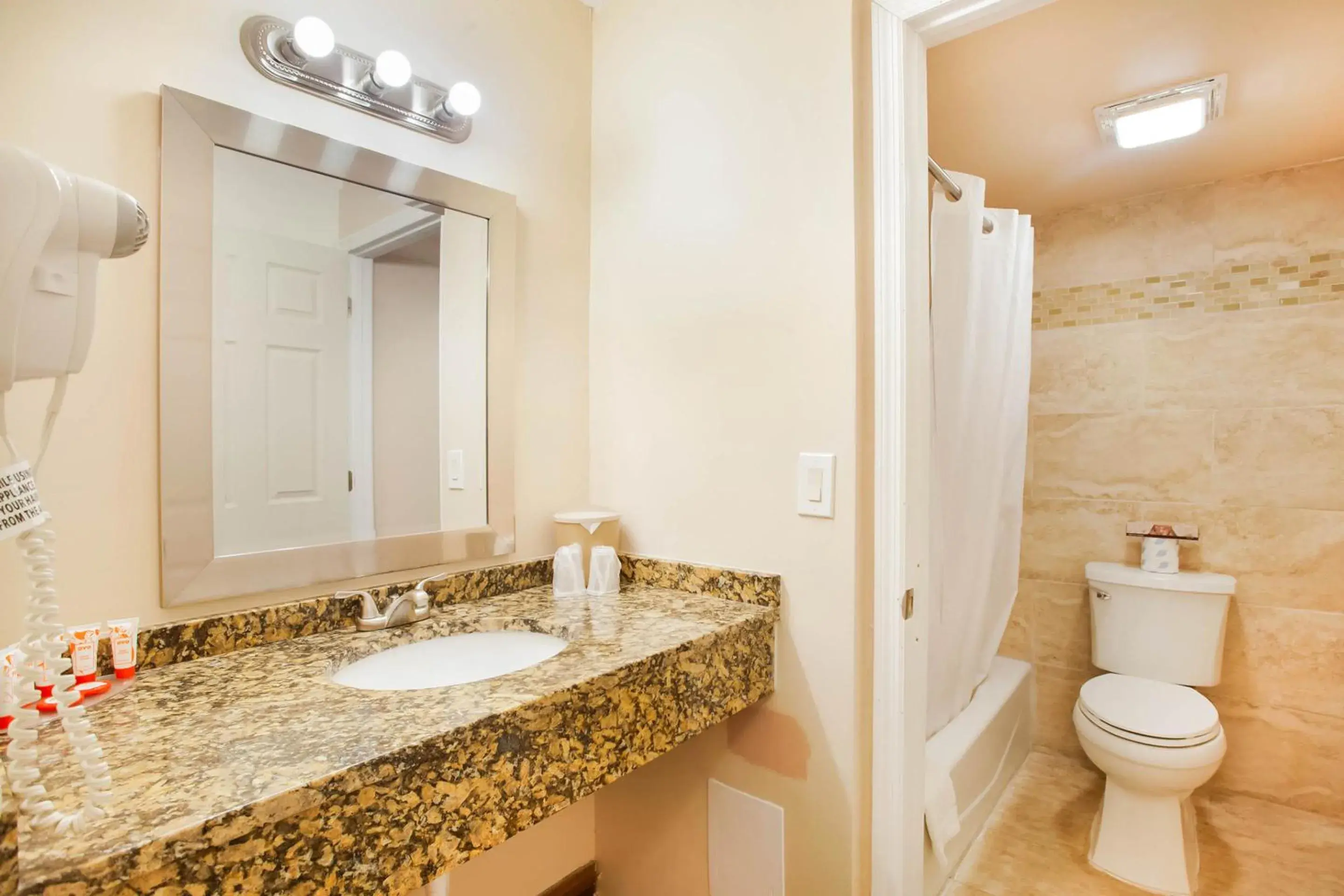 Bathroom in OYO Waterfront Hotel- Cape Coral Fort Myers, FL