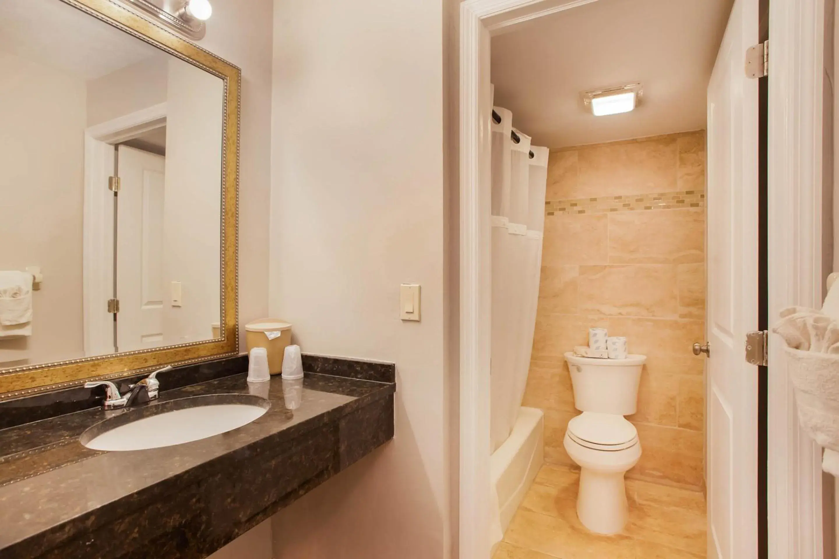 Bathroom in OYO Waterfront Hotel- Cape Coral Fort Myers, FL