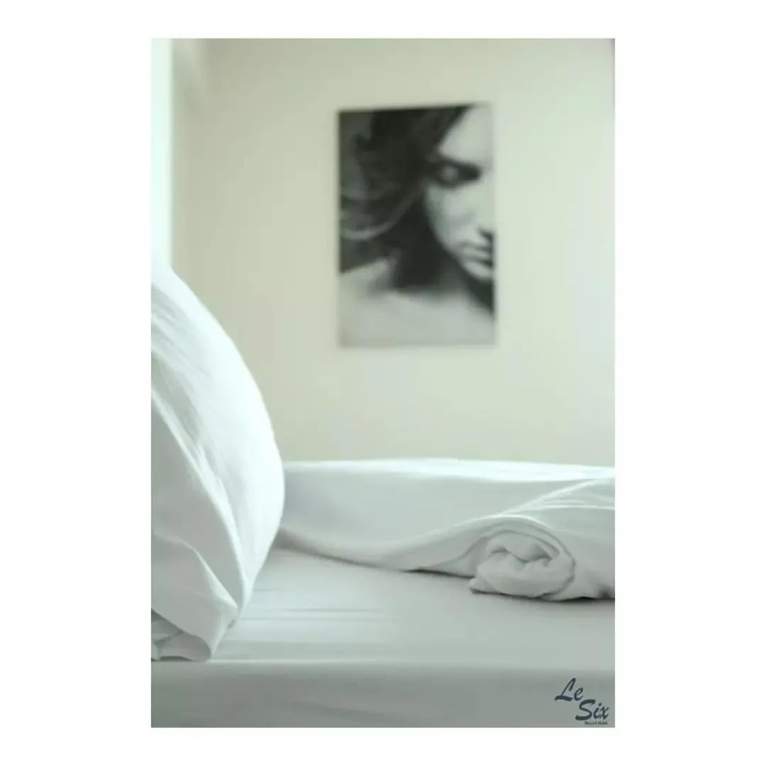 Bed in Le Six Hotel And Resort
