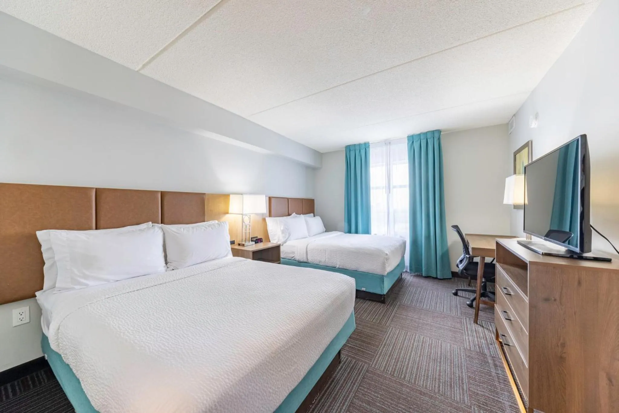 Photo of the whole room, Bed in Staybridge Suites Guelph by IHG