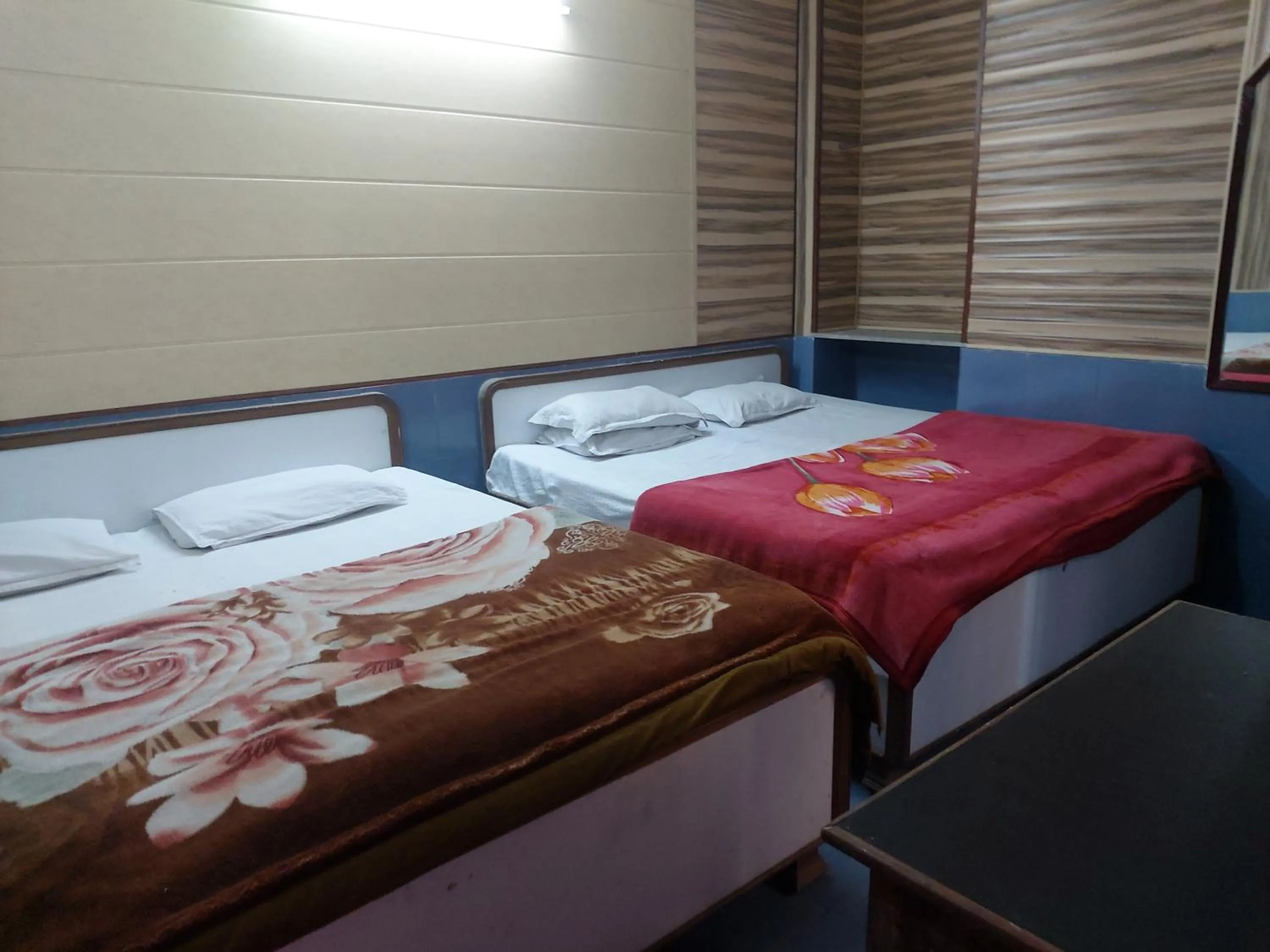 Bed in Hotel Vijay laxmi