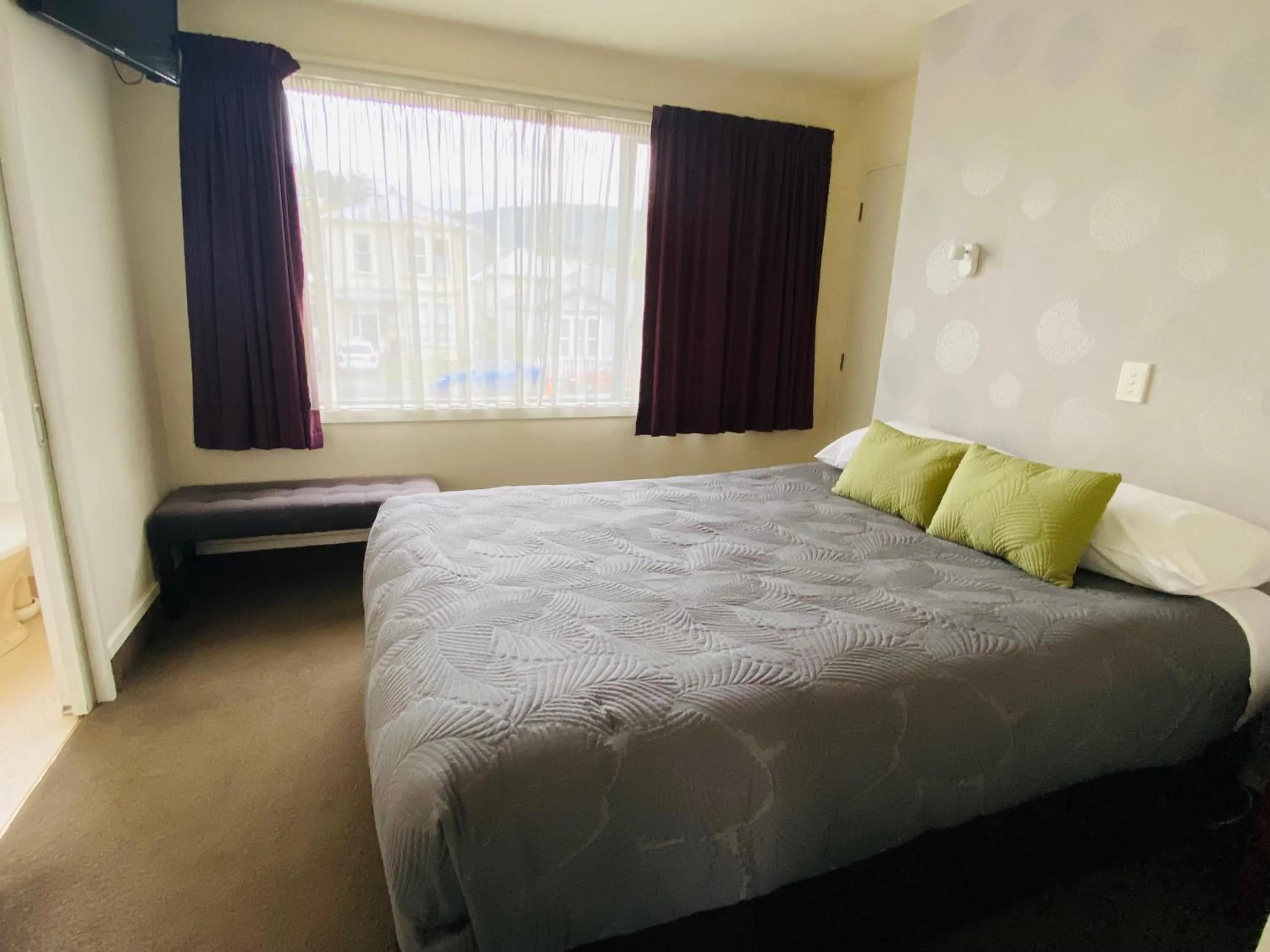 Bed in Commodore Motel