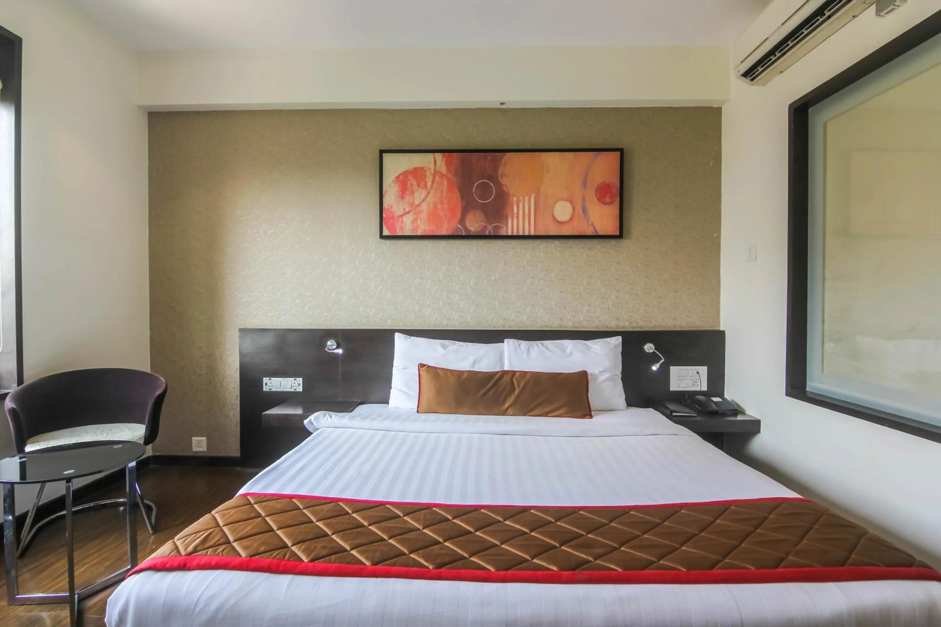 Bedroom, Bed in Hotel LXIA Hinjewadi - Indian Nationals Only