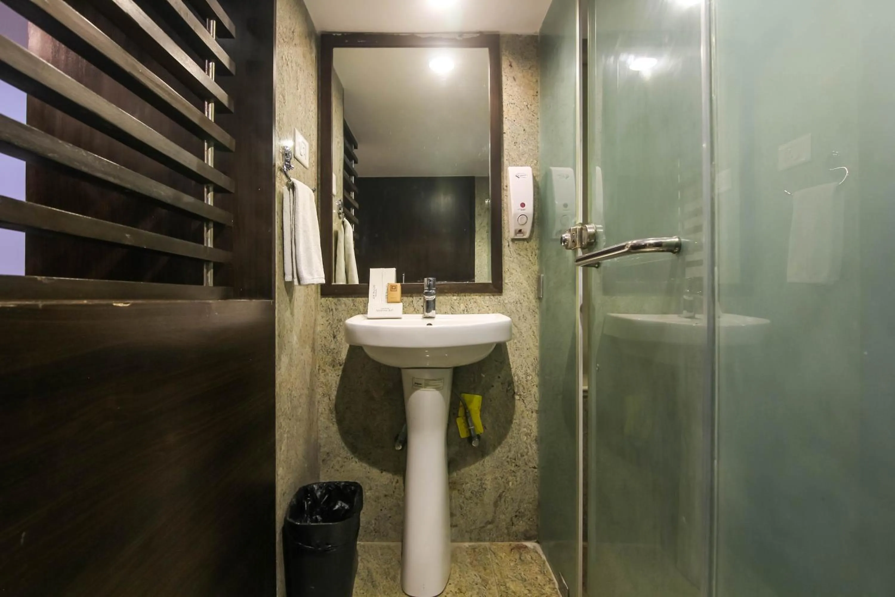 Bathroom in Hotel LXIA Hinjewadi - Indian Nationals Only