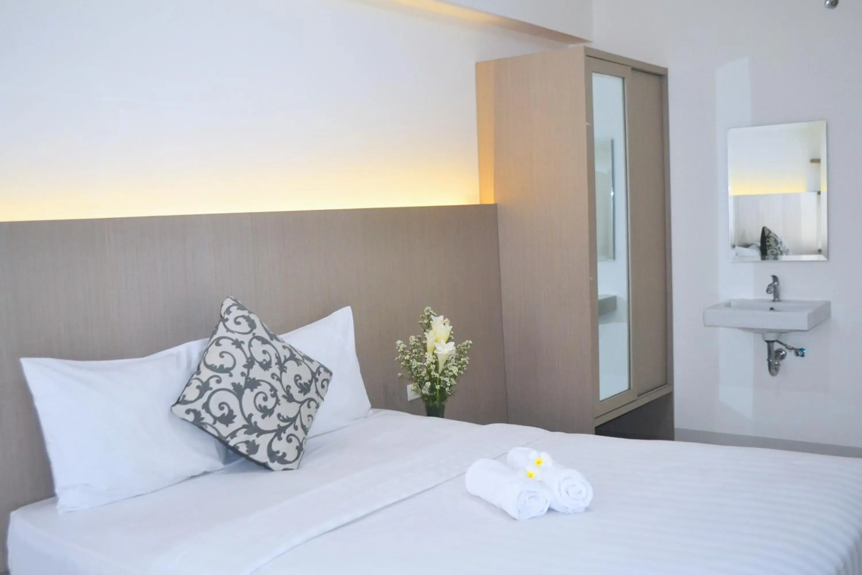 Bed in Candiland Apartment by Sinergi Bed in Candiland Apartment by Sinergi