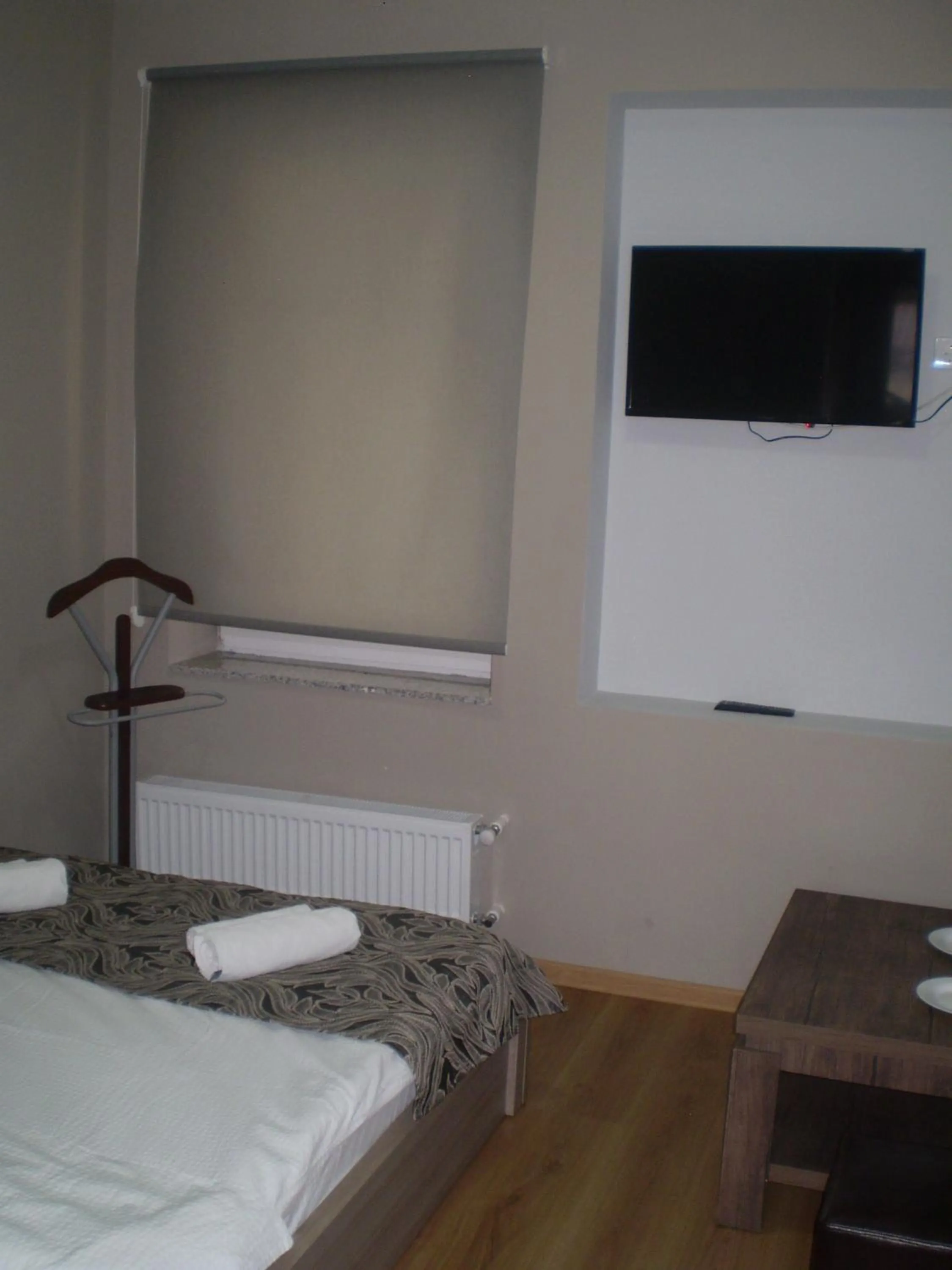 Photo of the whole room, Bed in New Hotel