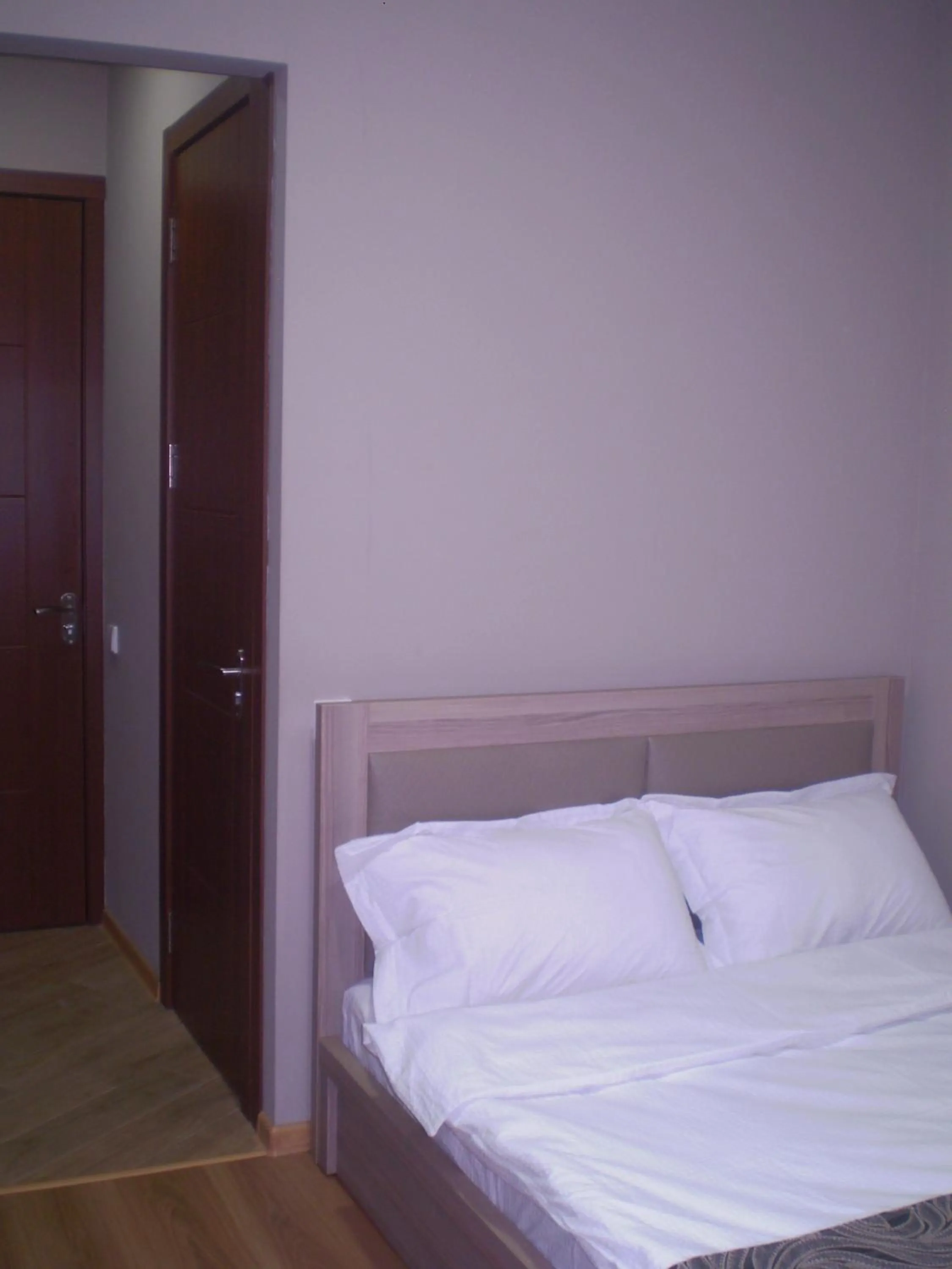 Photo of the whole room, Bed in New Hotel