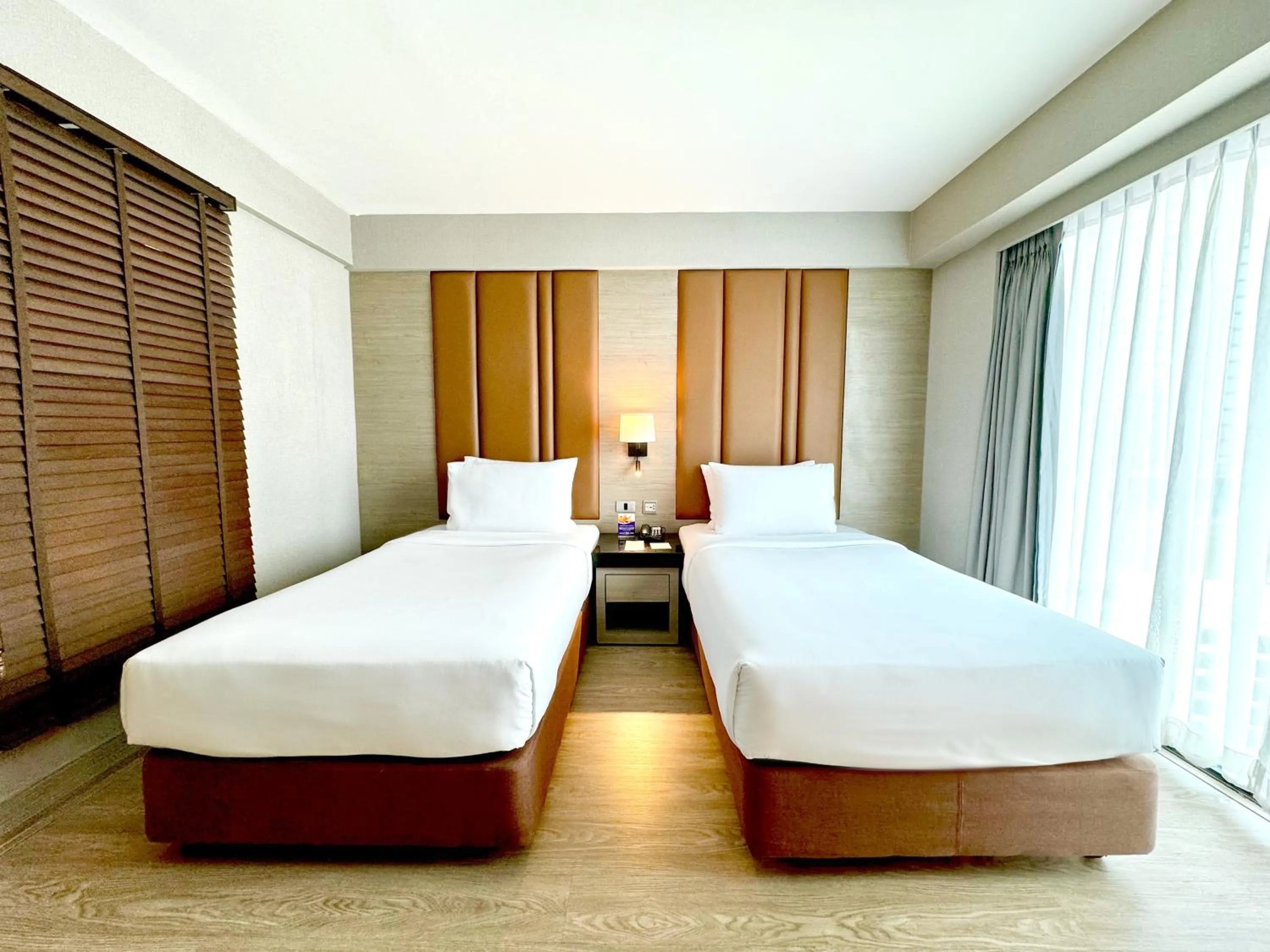 Bed in Ramada Sukhumvit Soi Eleven