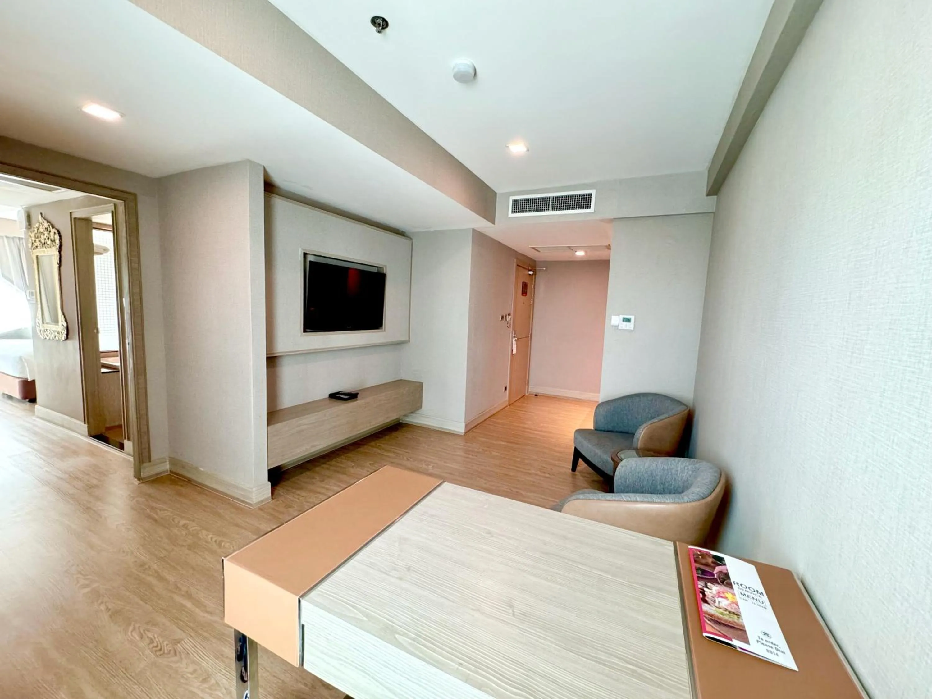 Communal lounge/ TV room in Ramada Sukhumvit Soi Eleven
