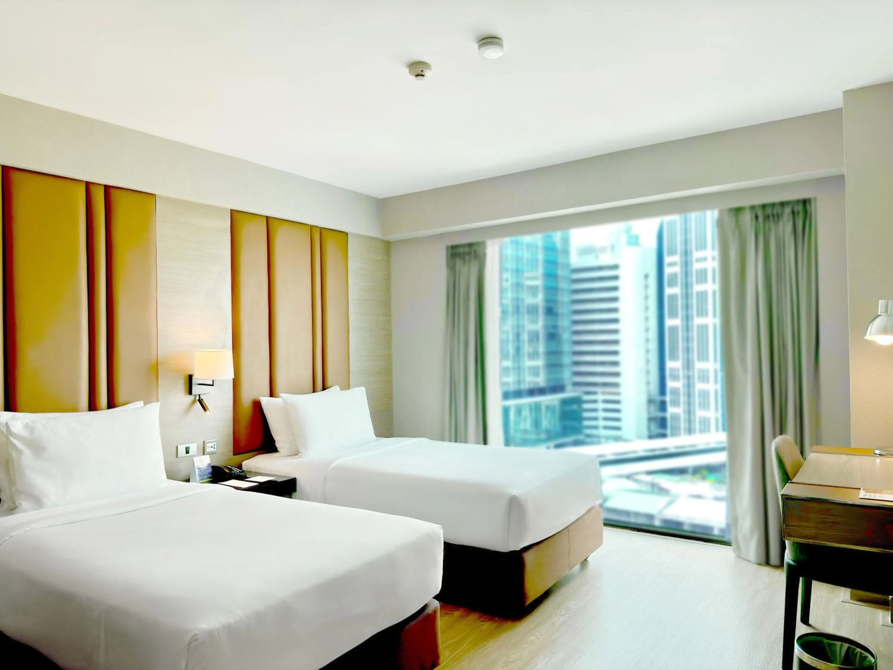 Bed in Ramada Sukhumvit Soi Eleven