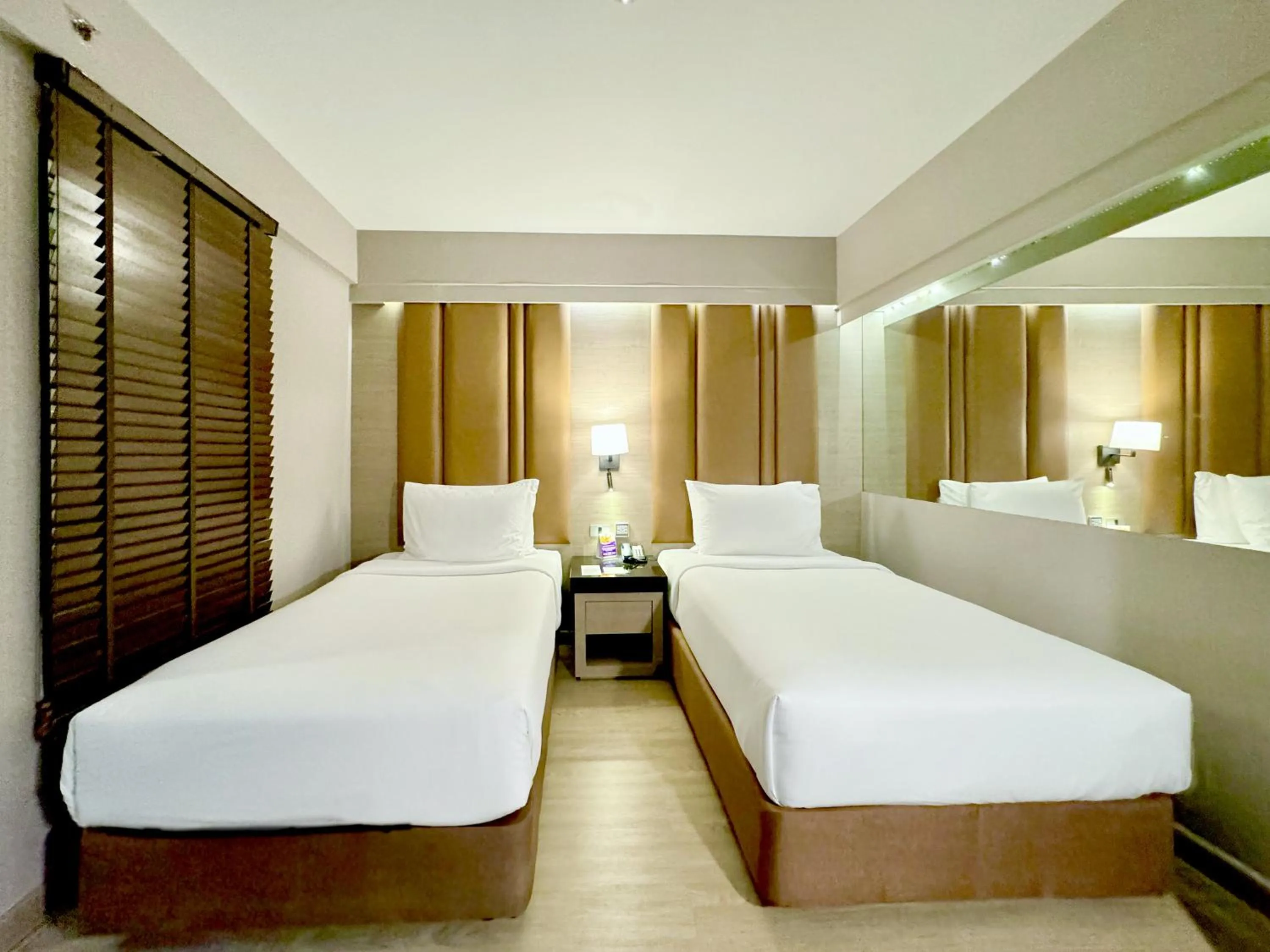 Bed in Ramada Sukhumvit Soi Eleven