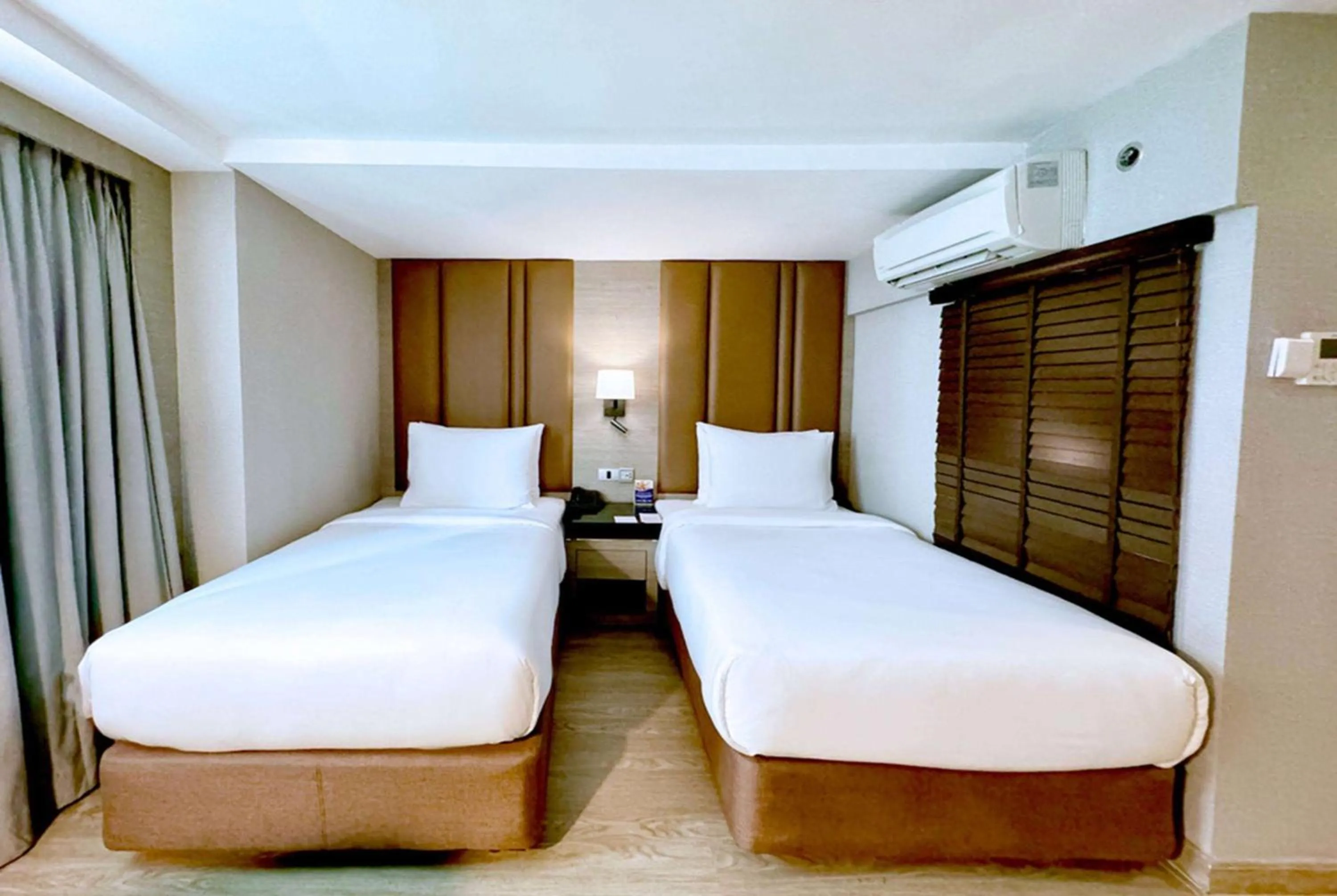 Photo of the whole room, Bed in Ramada Sukhumvit Soi Eleven