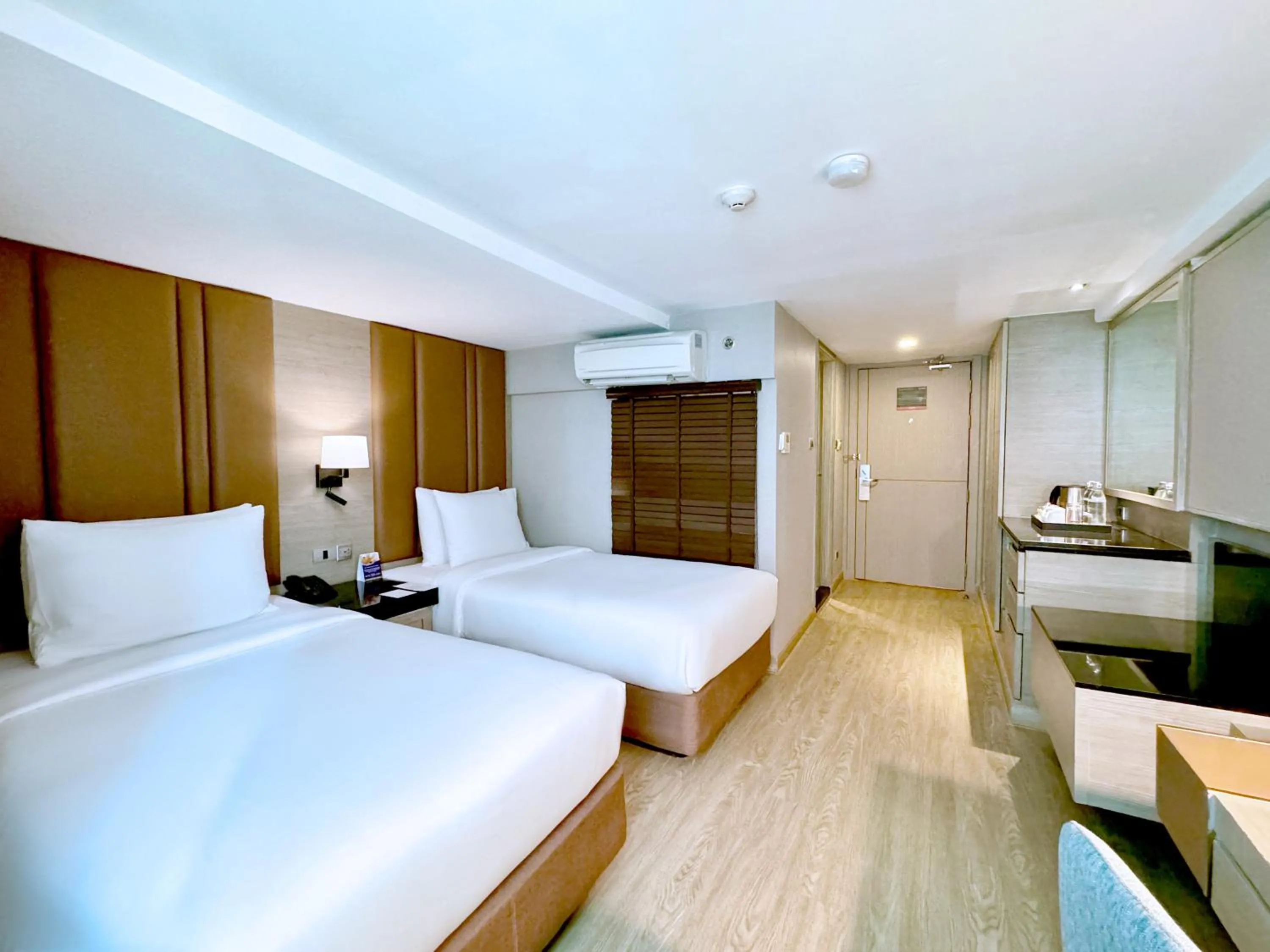 Bed in Ramada Sukhumvit Soi Eleven