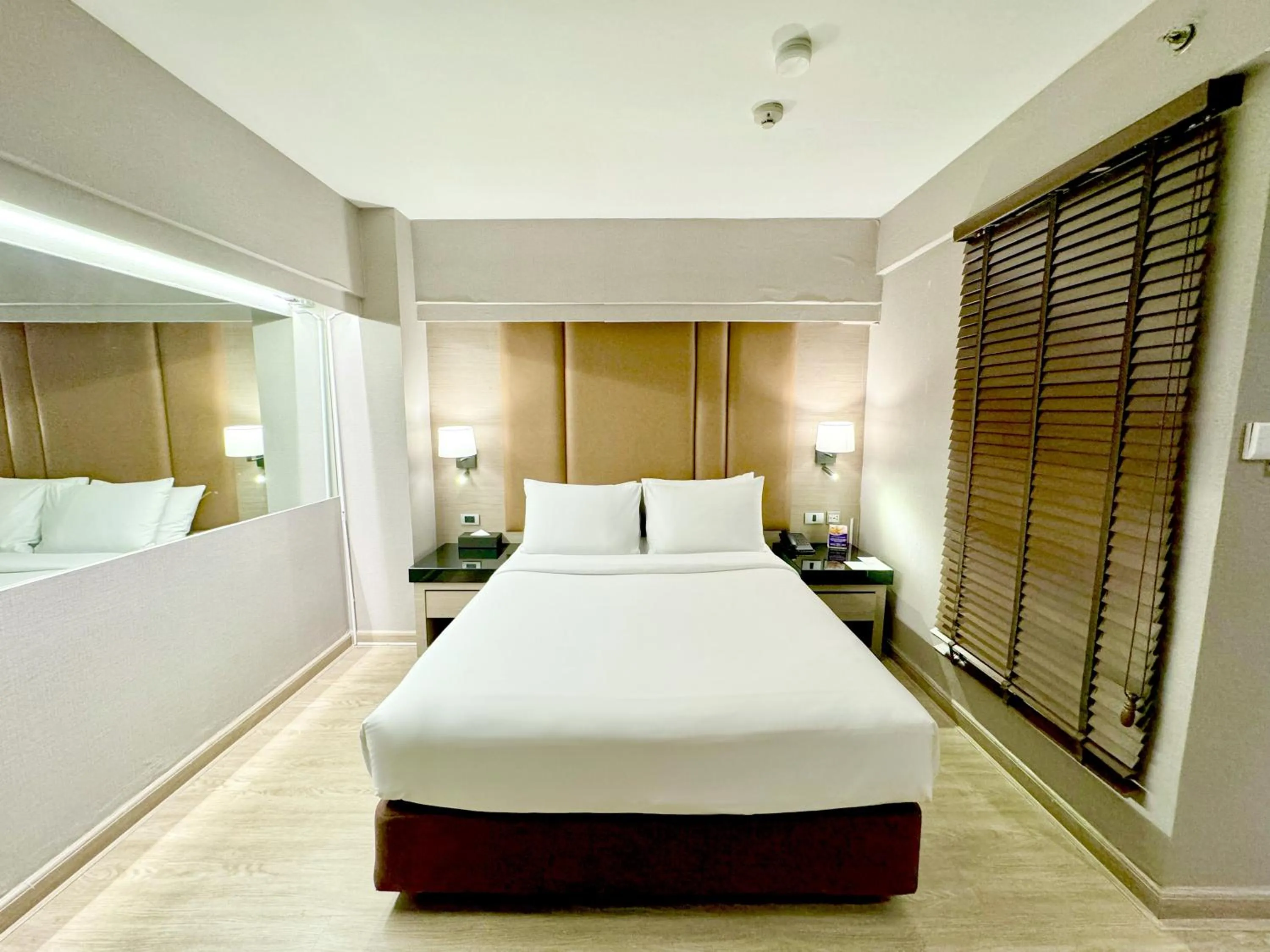 Bed in Ramada Sukhumvit Soi Eleven