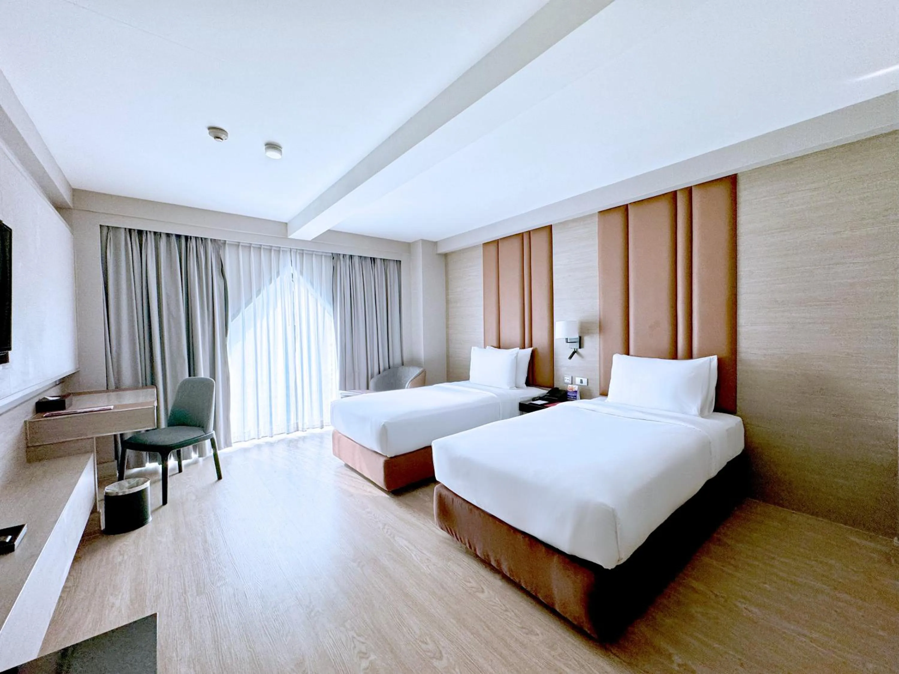 Bed in Ramada Sukhumvit Soi Eleven
