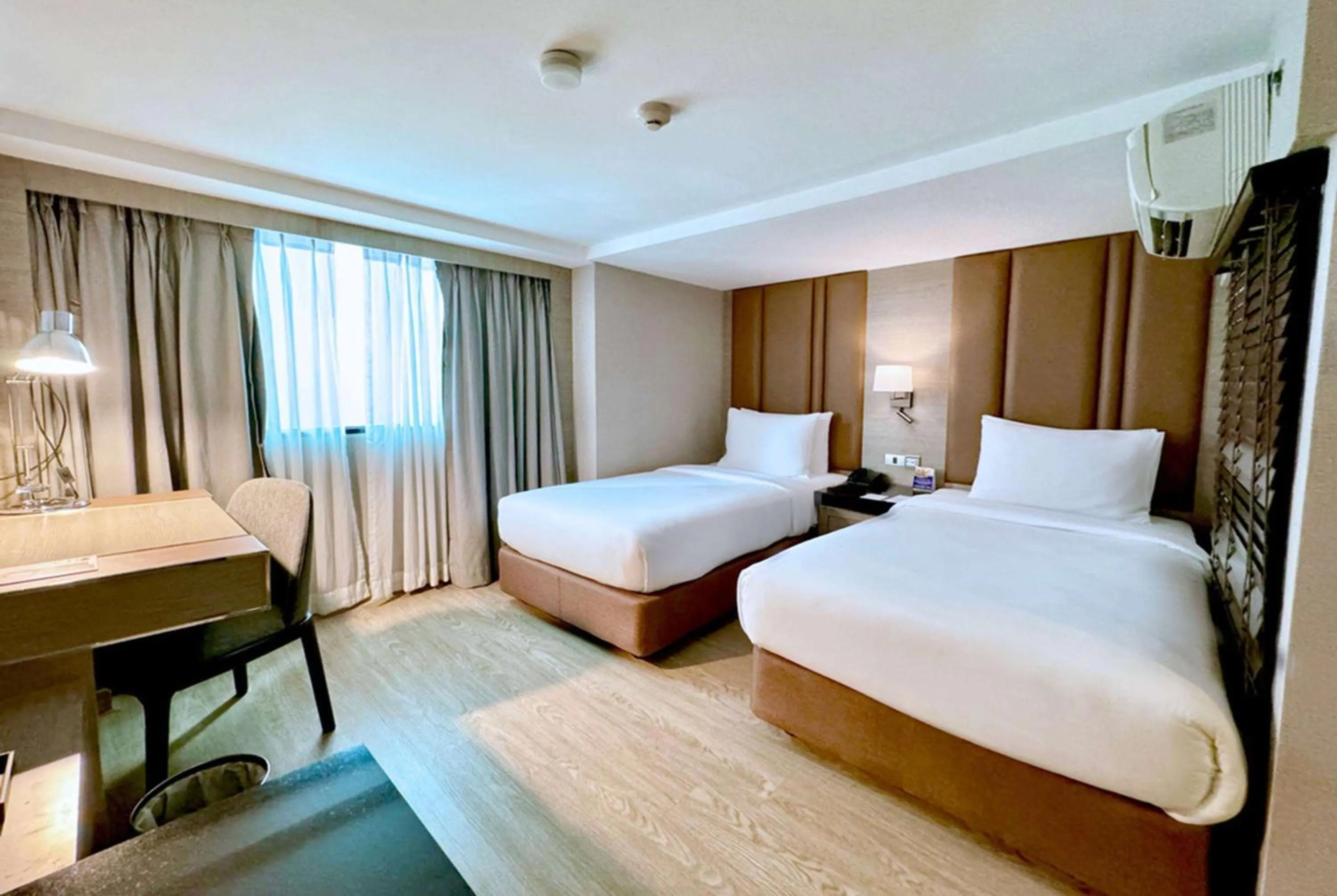 Photo of the whole room, Bed in Ramada Sukhumvit Soi Eleven