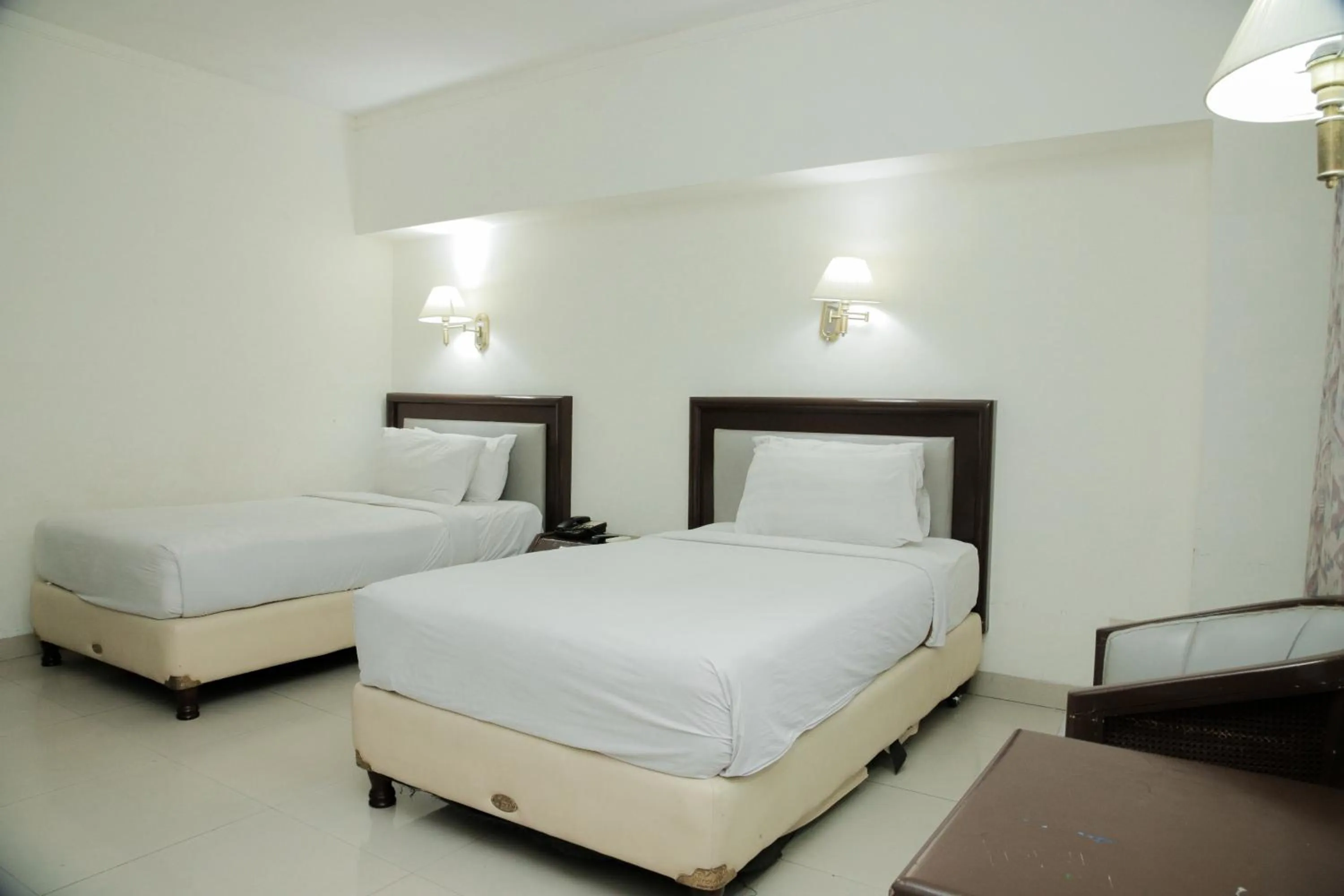 Photo of the whole room, Bed in Grand Inna Medan