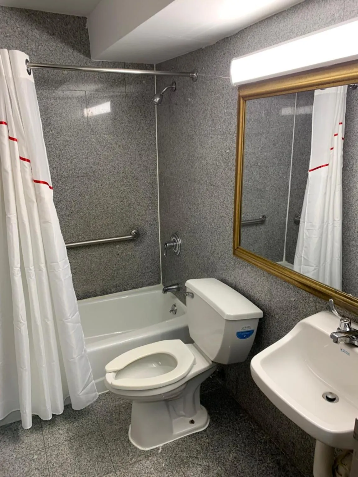 Bathroom in Days Inn by Wyndham Long Island/Copiague