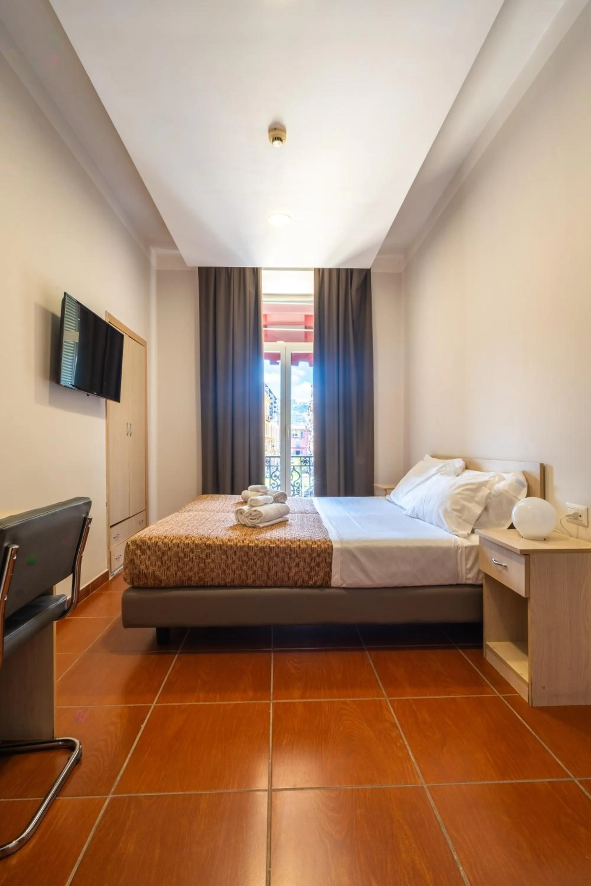 Bed in Hotel Diamond