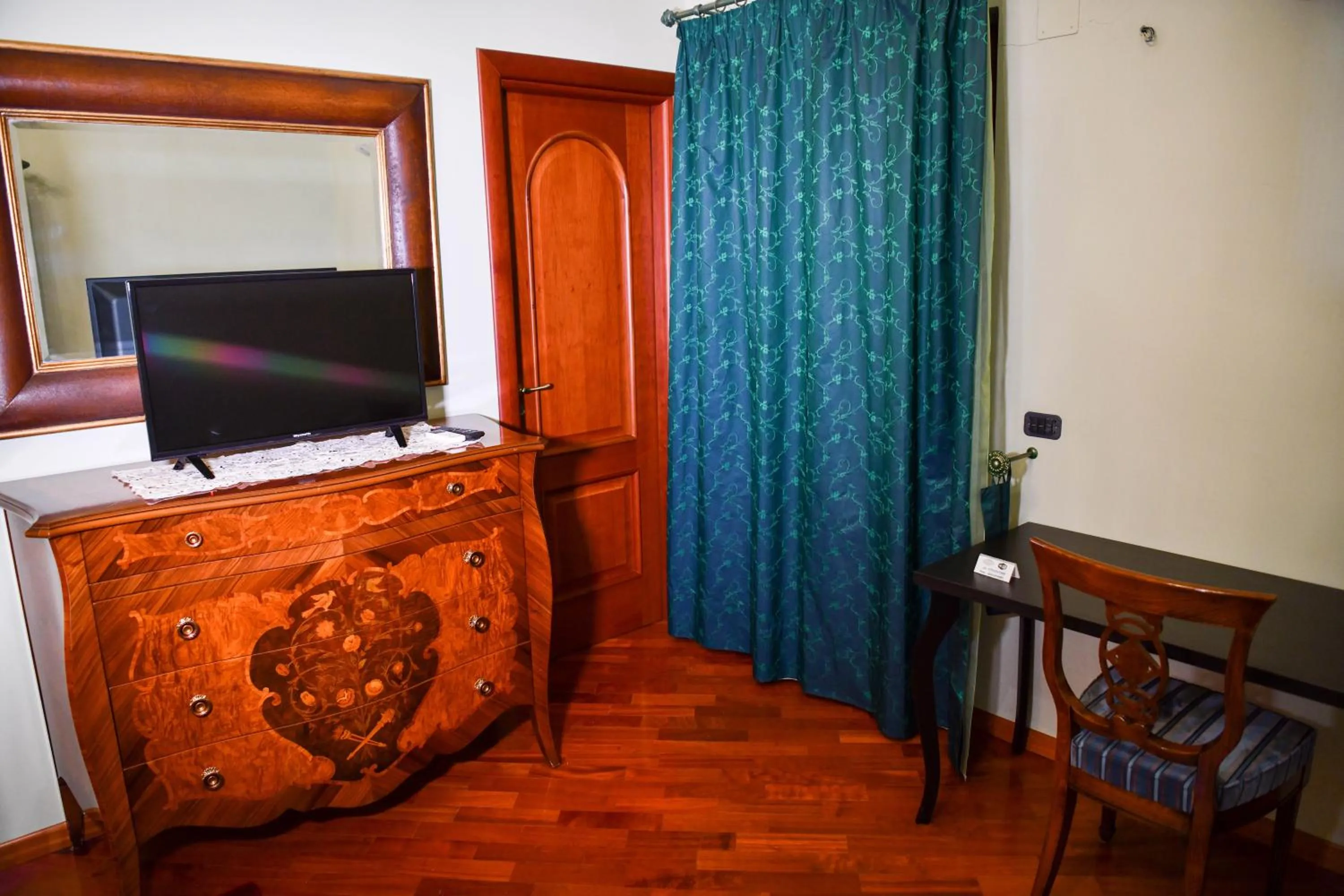 Decorative detail, Bed in Il Piccolo Hotel