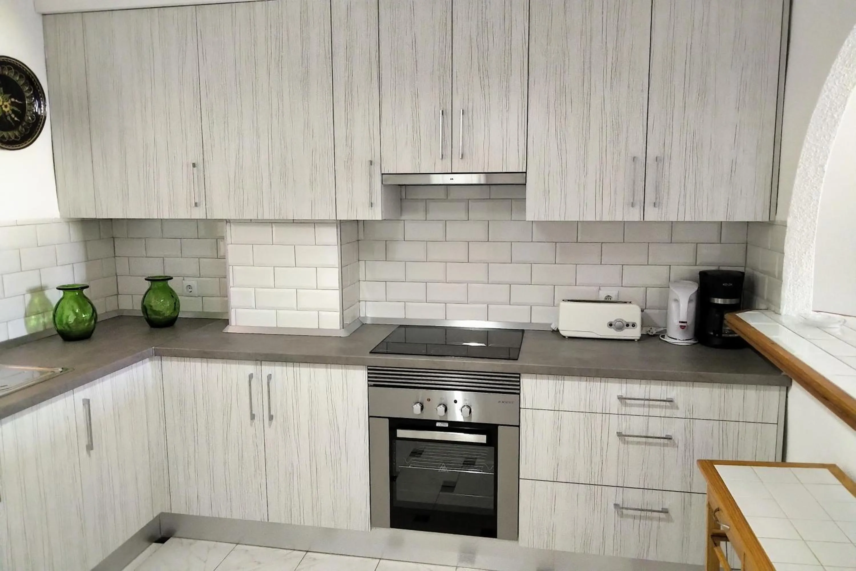 Kitchen or kitchenette in Shoal Apartamentos