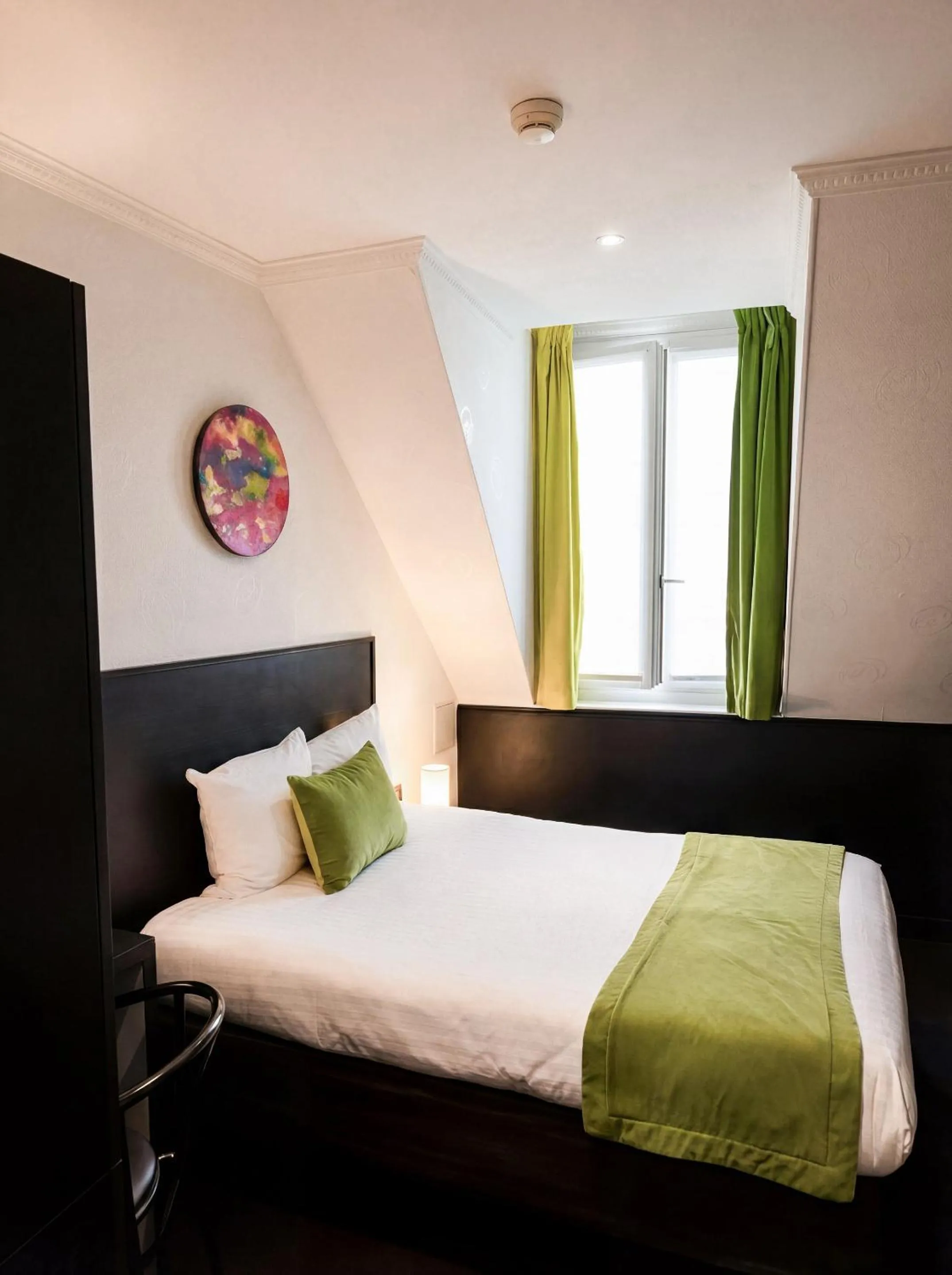 Bed in Hotel Peyris Opera