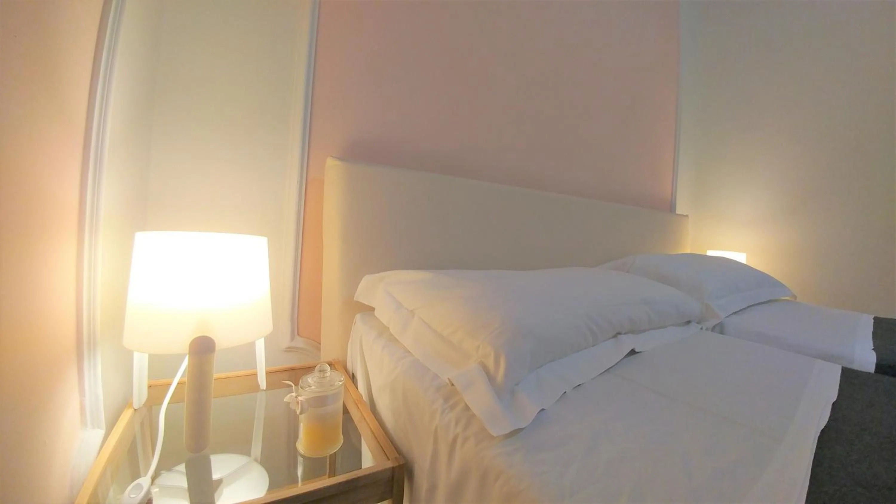 Decorative detail, Bed in Dreaming Navona Rooms