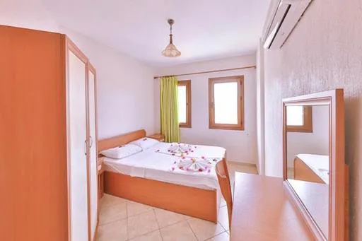 Bed in Minta Apartments
