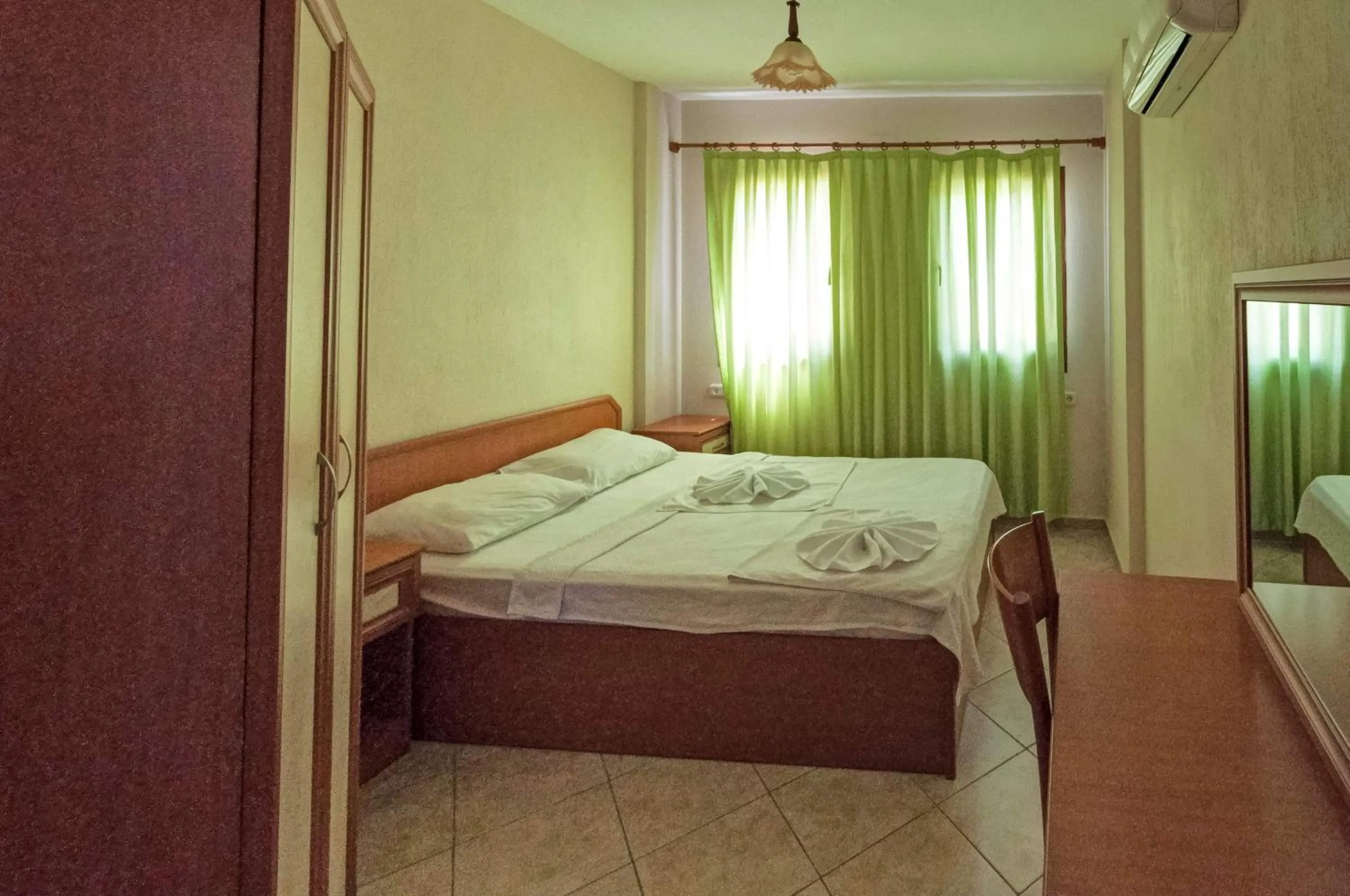 Bed in Minta Apartments