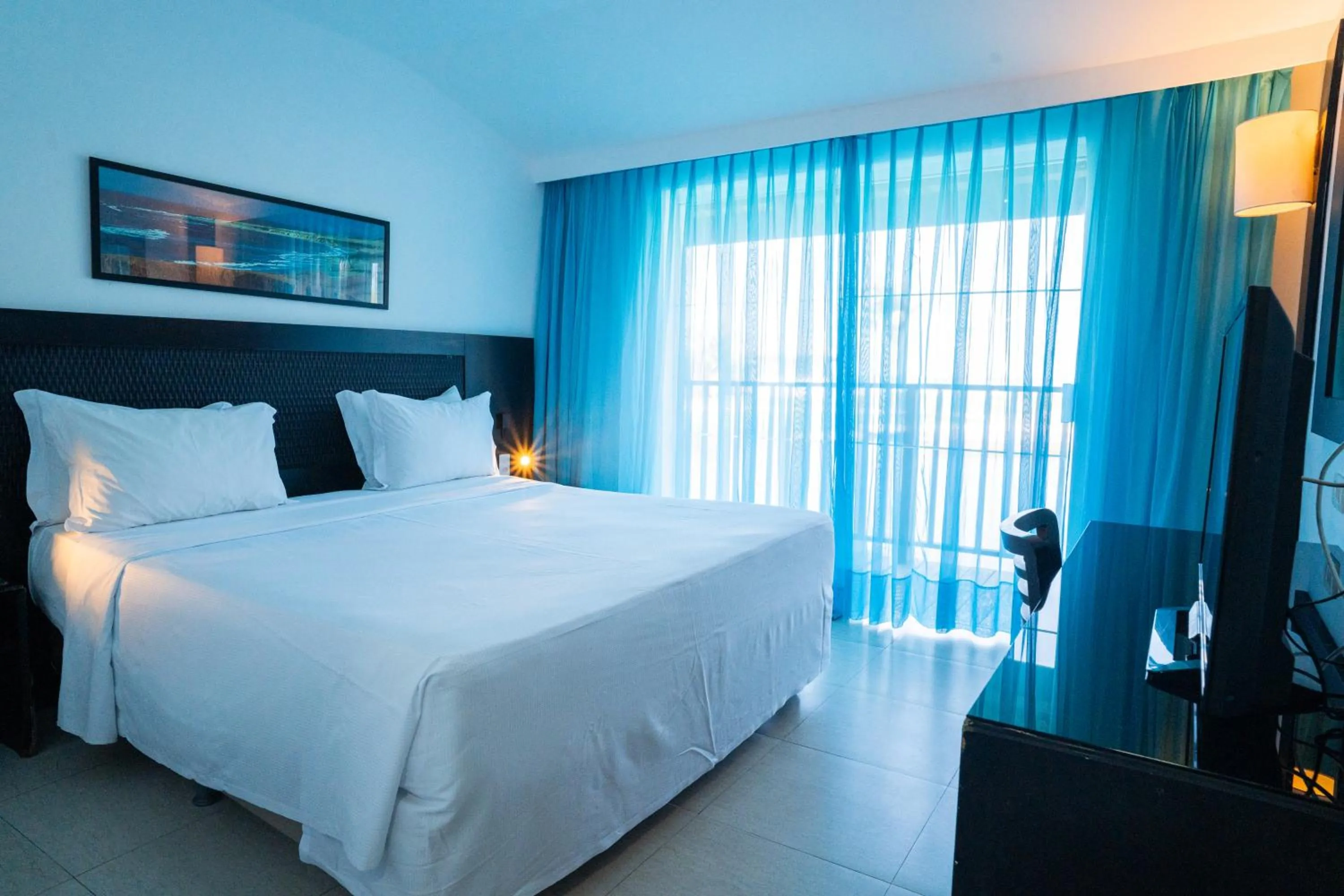 Bed in Dom Pedro Laguna Beach Resort & Golf by WAM Experience