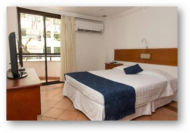 Bed in Hotel Solar do Amanhecer