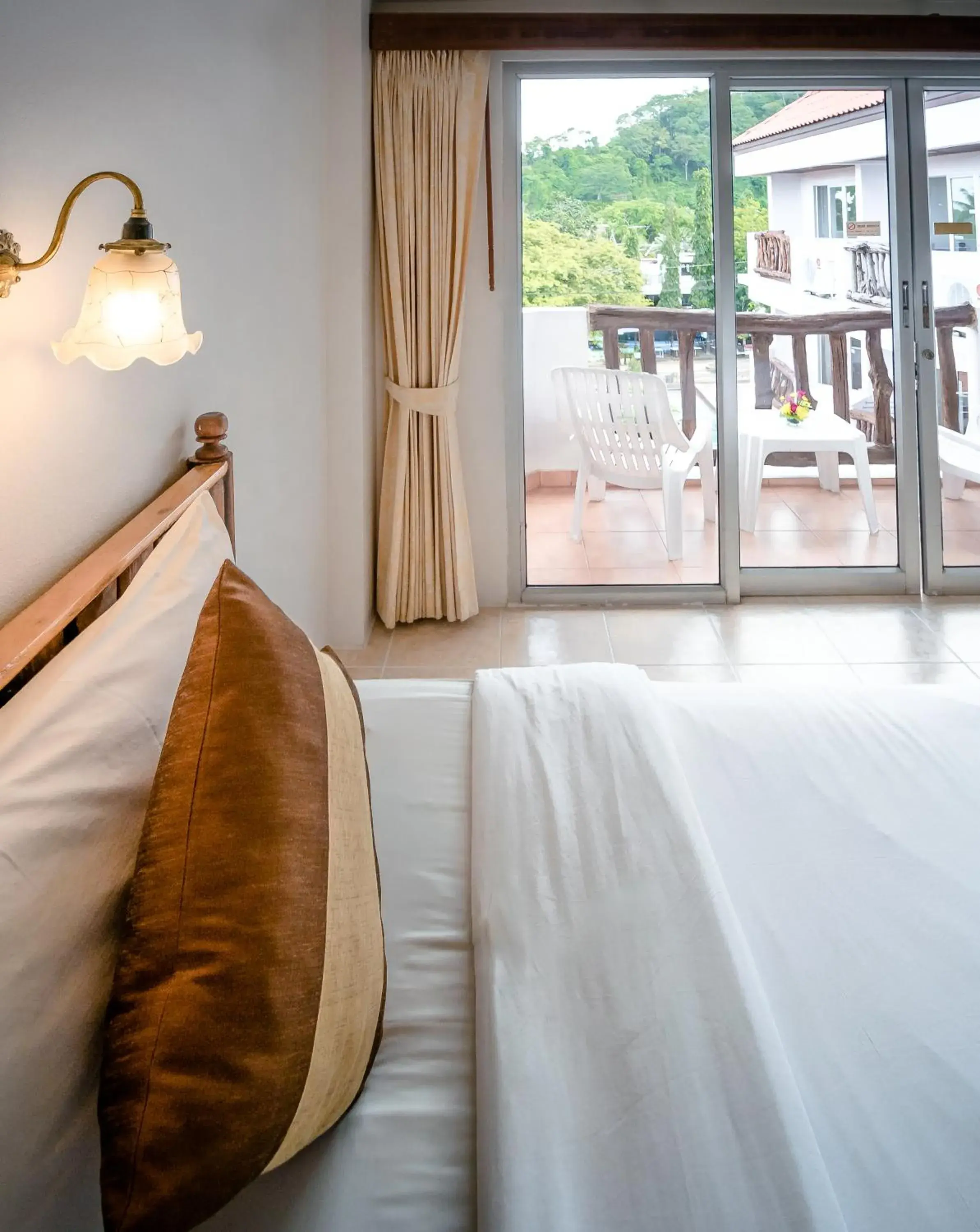 Balcony/Terrace, Bed in Aonang Sunset Hotel - SHA Extra Plus Balcony/Terrace, Bed in Aonang Sunset Hotel - SHA Extra Plus