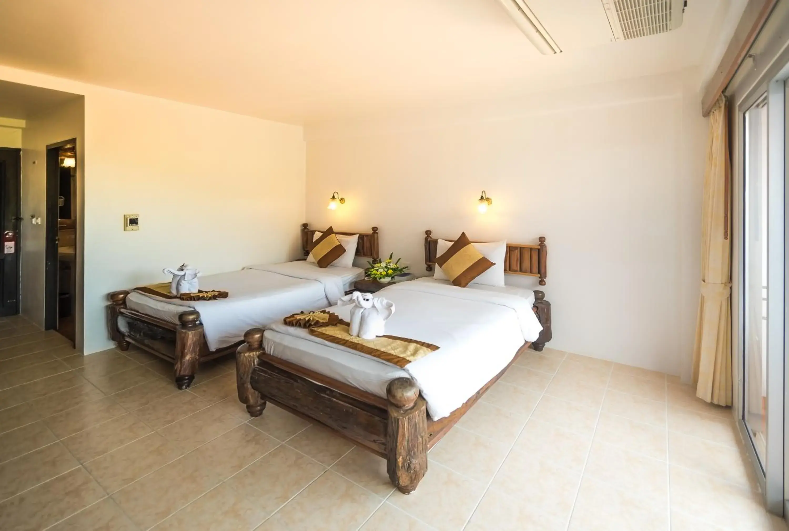 Bedroom, Bed in Aonang Sunset Hotel - SHA Extra Plus Bedroom, Bed in Aonang Sunset Hotel - SHA Extra Plus