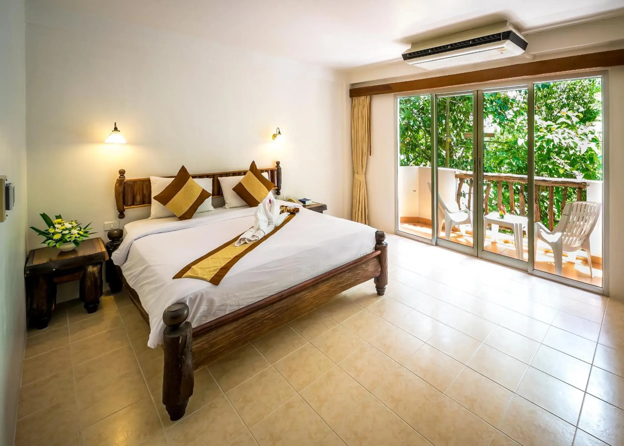 Garden view, Bed in Aonang Sunset Hotel - SHA Extra Plus Garden view, Bed in Aonang Sunset Hotel - SHA Extra Plus