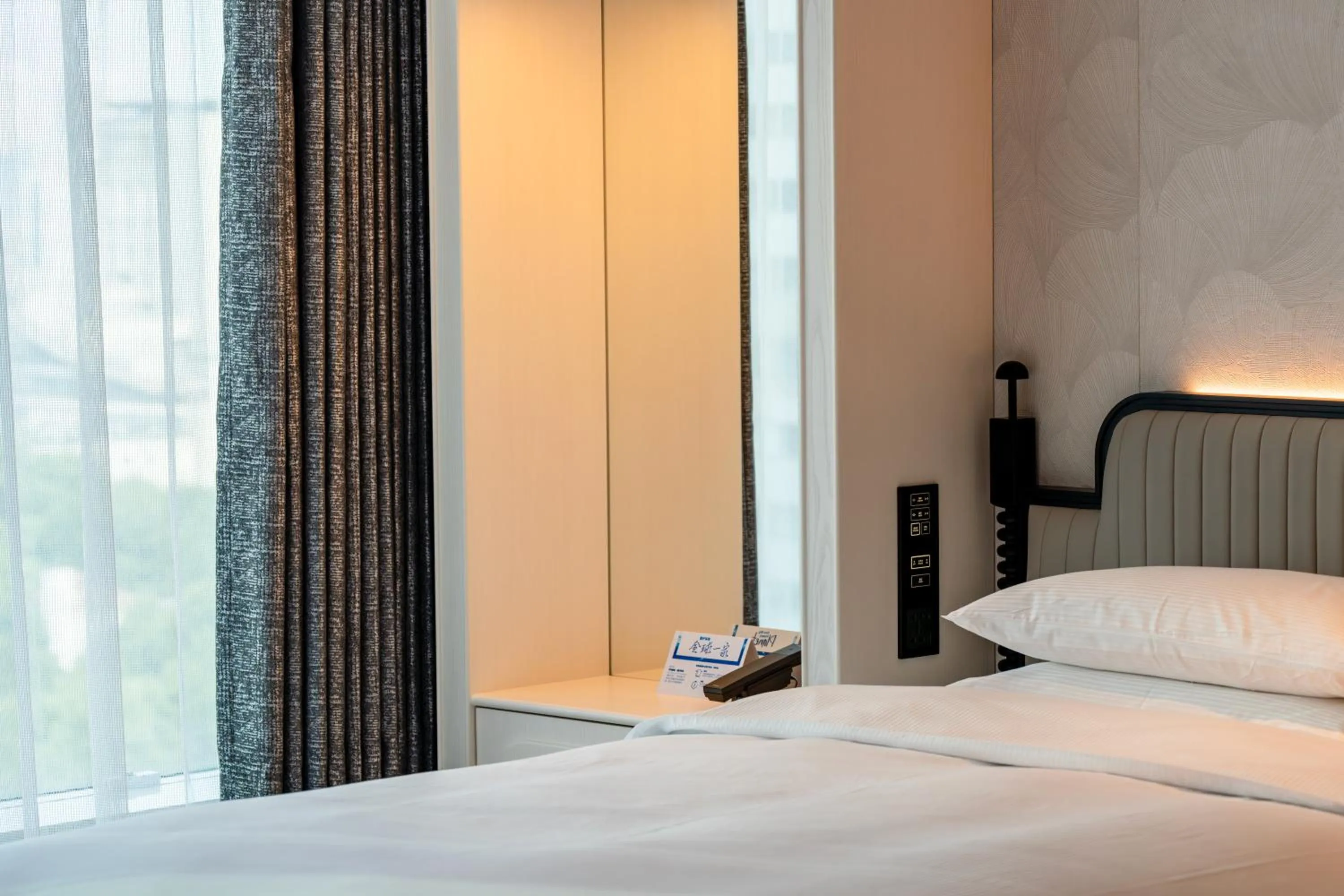 Bed in Hilton Shanghai City Center -Steps from iconic landmarks Wukang Mansion and Jing'an Temple