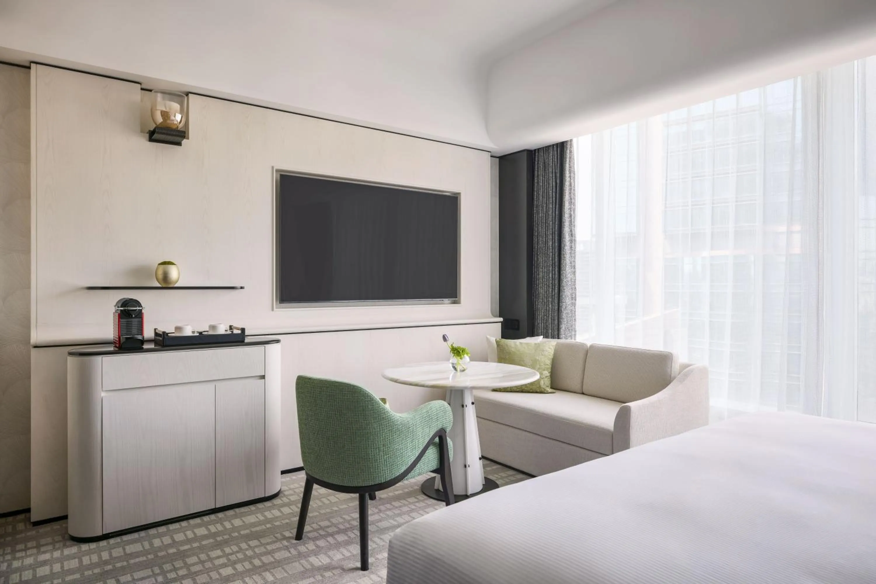 Seating area, Bed in Hilton Shanghai City Center -Steps from iconic landmarks Wukang Mansion and Jing'an Temple